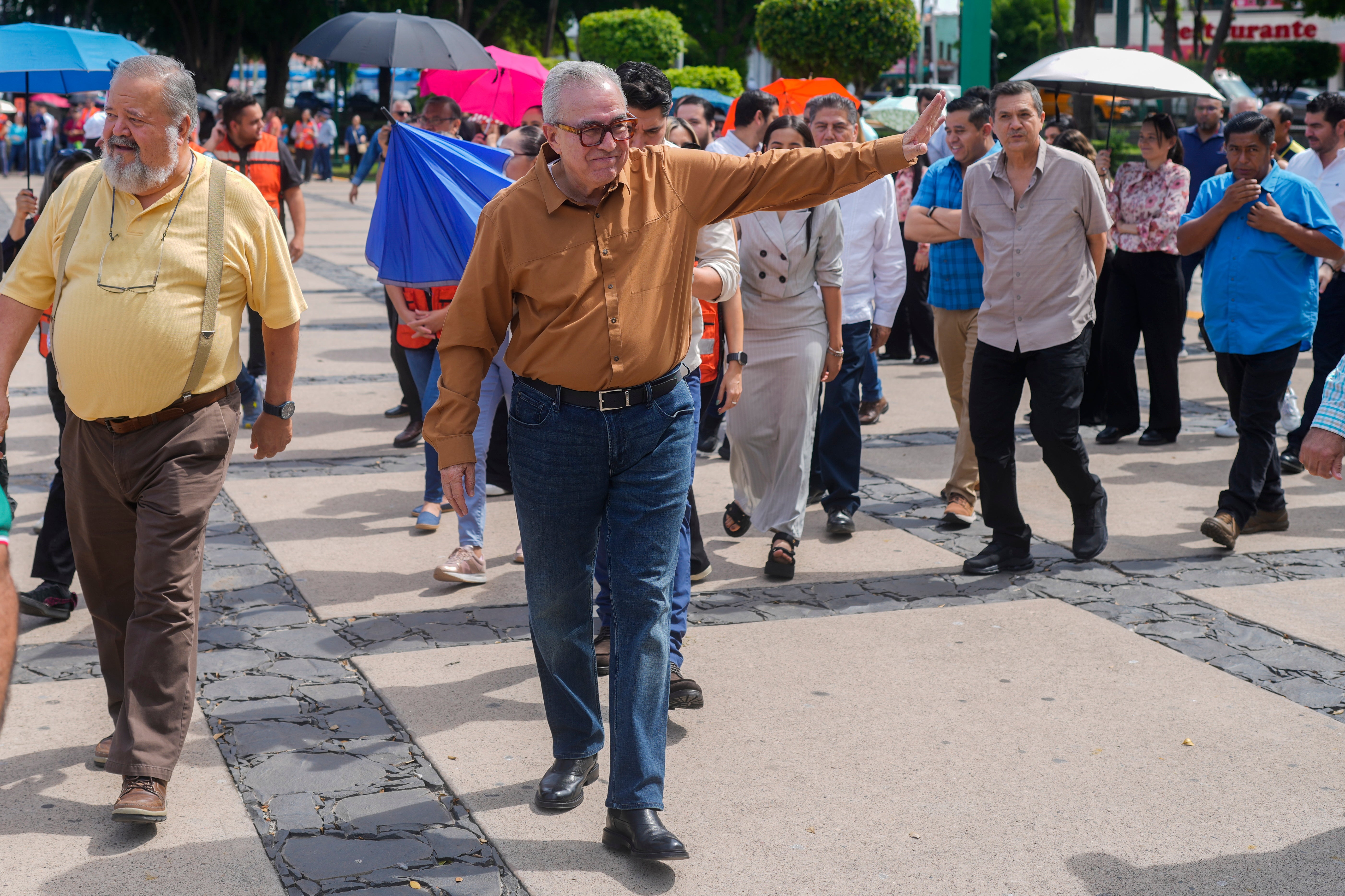Sinaloa state Gov. Ruben Rocha waves as he takes part in an annual earthquake drill in Culiacan, Mexico