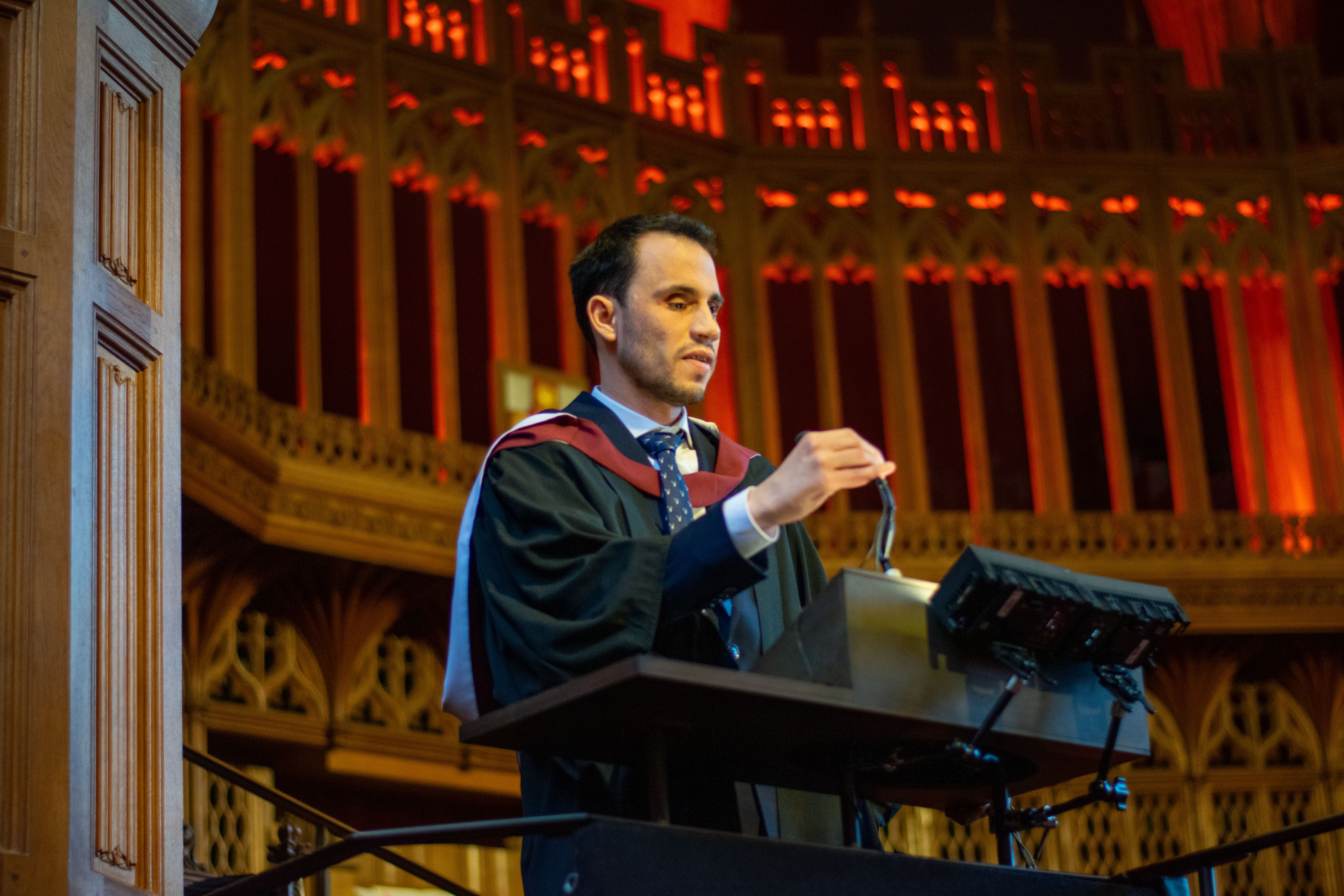 Maher Fattouh speaks to the crowd at his graduation (University of Bristol/PA)