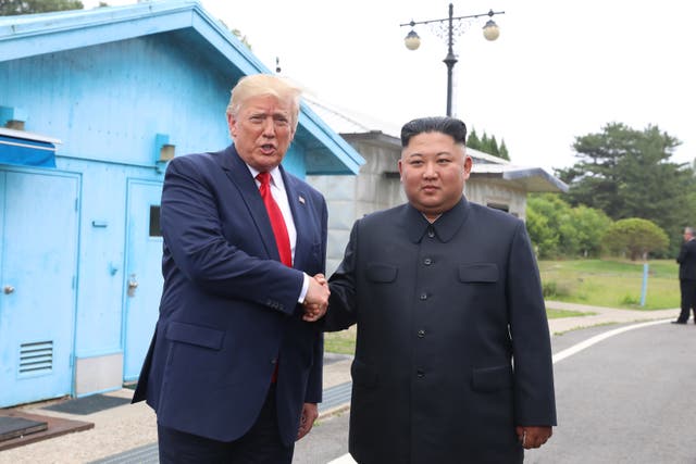 <p>File. Donald Trump and Kim Jong Un at their last meeting in 2019</p>