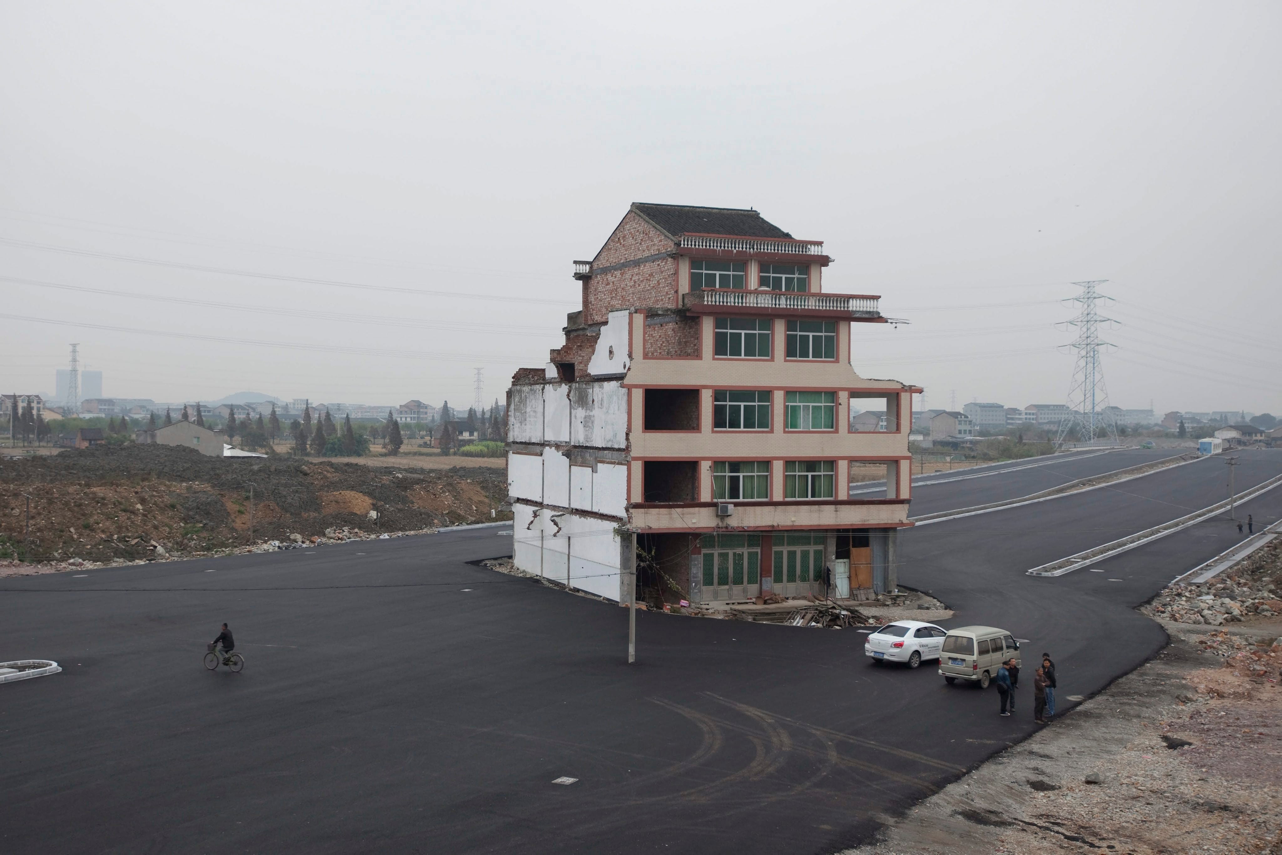 A five-floor ‘nail house’ in China’s Zhejiang province. It was demolished in 2012 after the owner finally accepted compensation to move