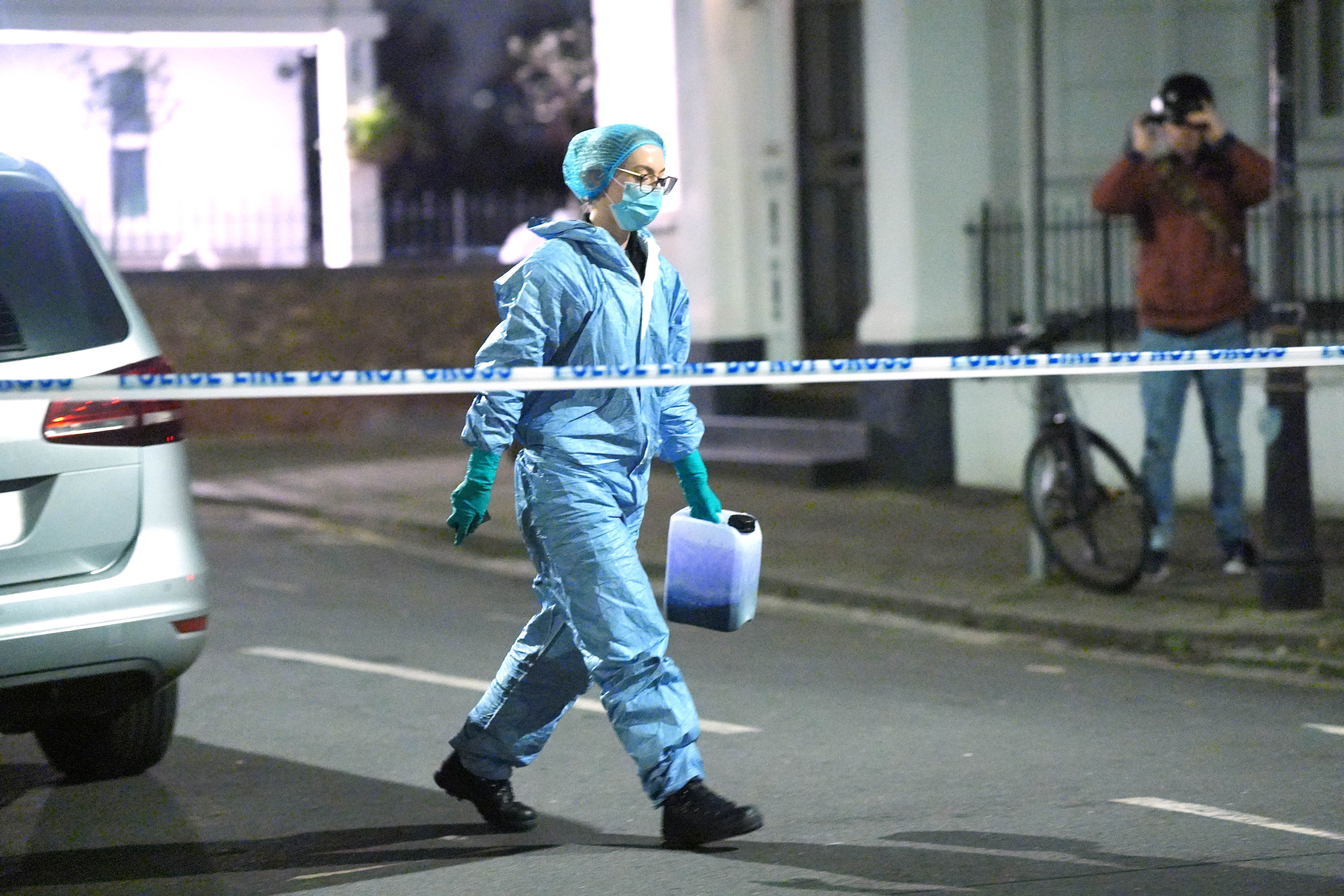 Police at the scene in Deodar Road, Putney, south-west London (Yui Mok/PA)