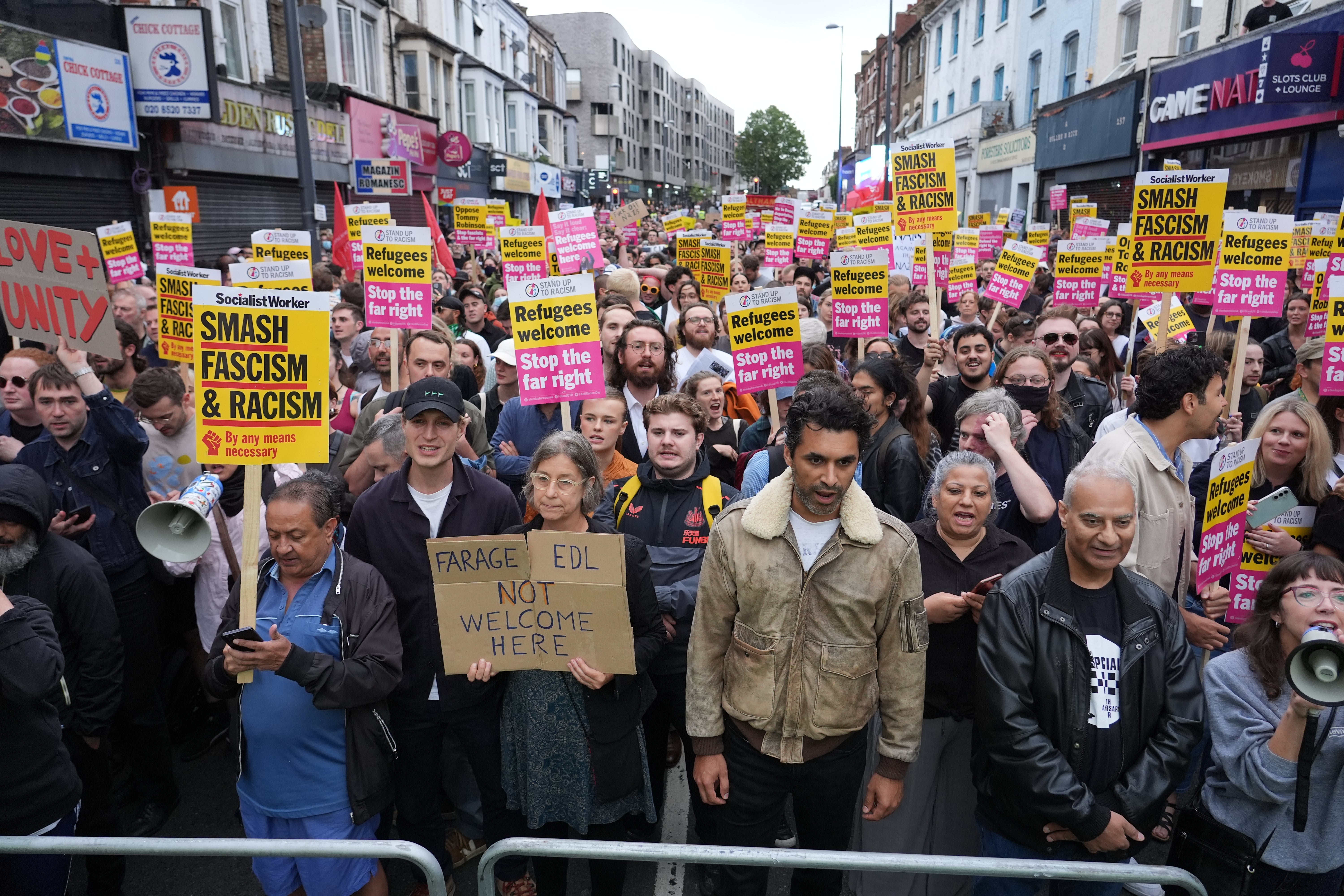 Demonstrators at an anti-racism protest in Walthamstow, east London, on 7 August 2024, following the summer riots