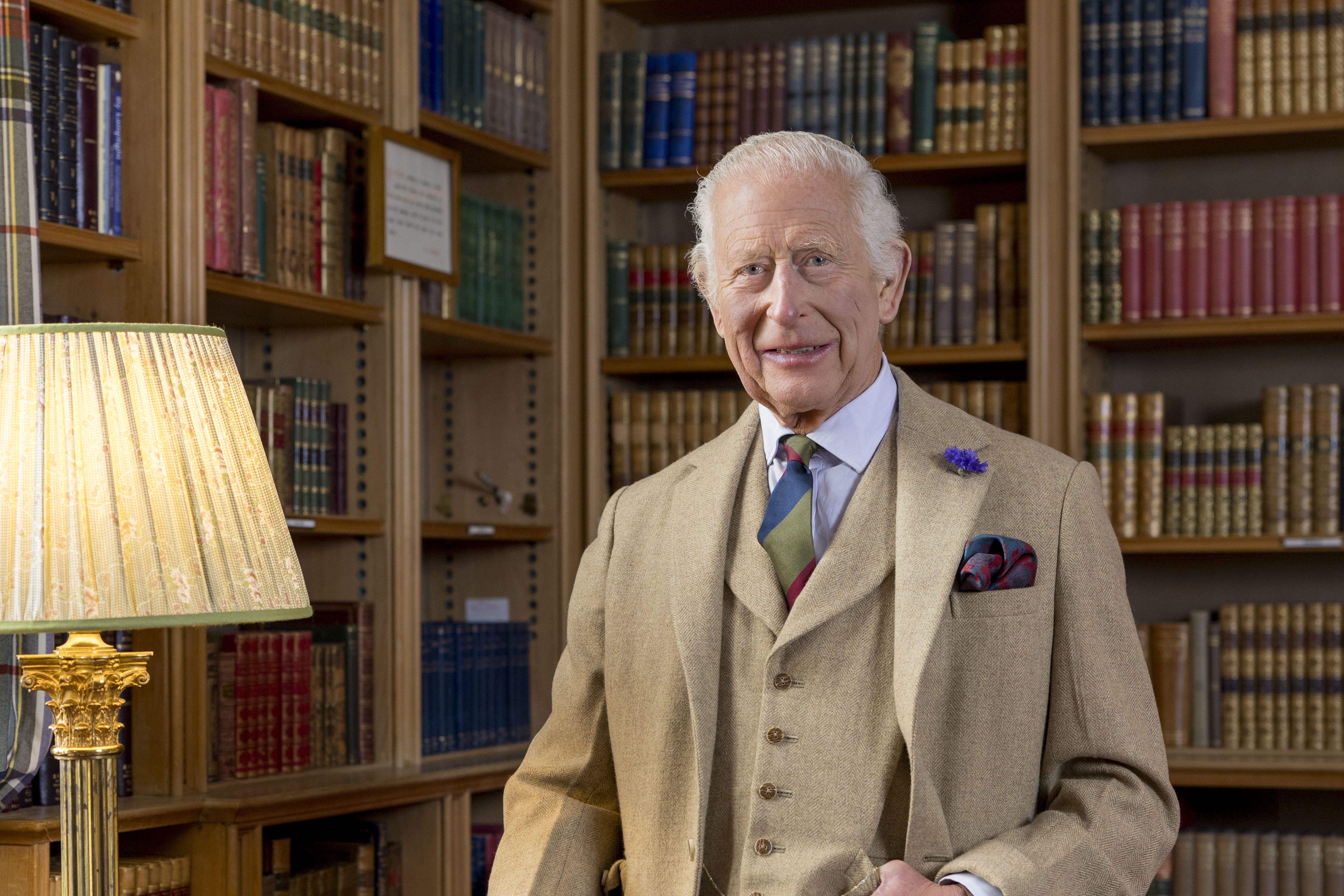 Charles was pictured in the library at Balmoral Castle (Millie Pilkington/PA)