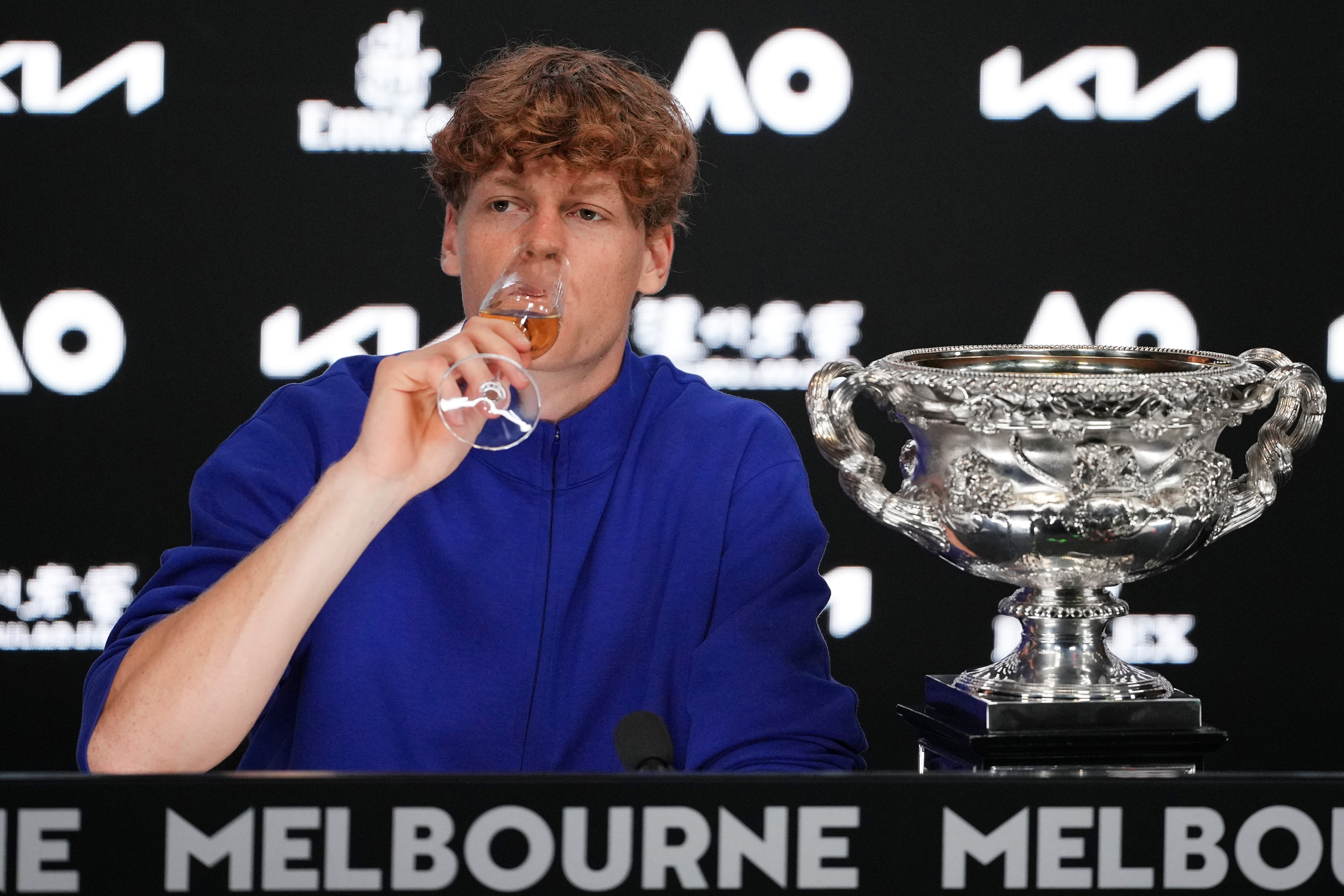 Sinner sips champagne after tasting success in Melbourne