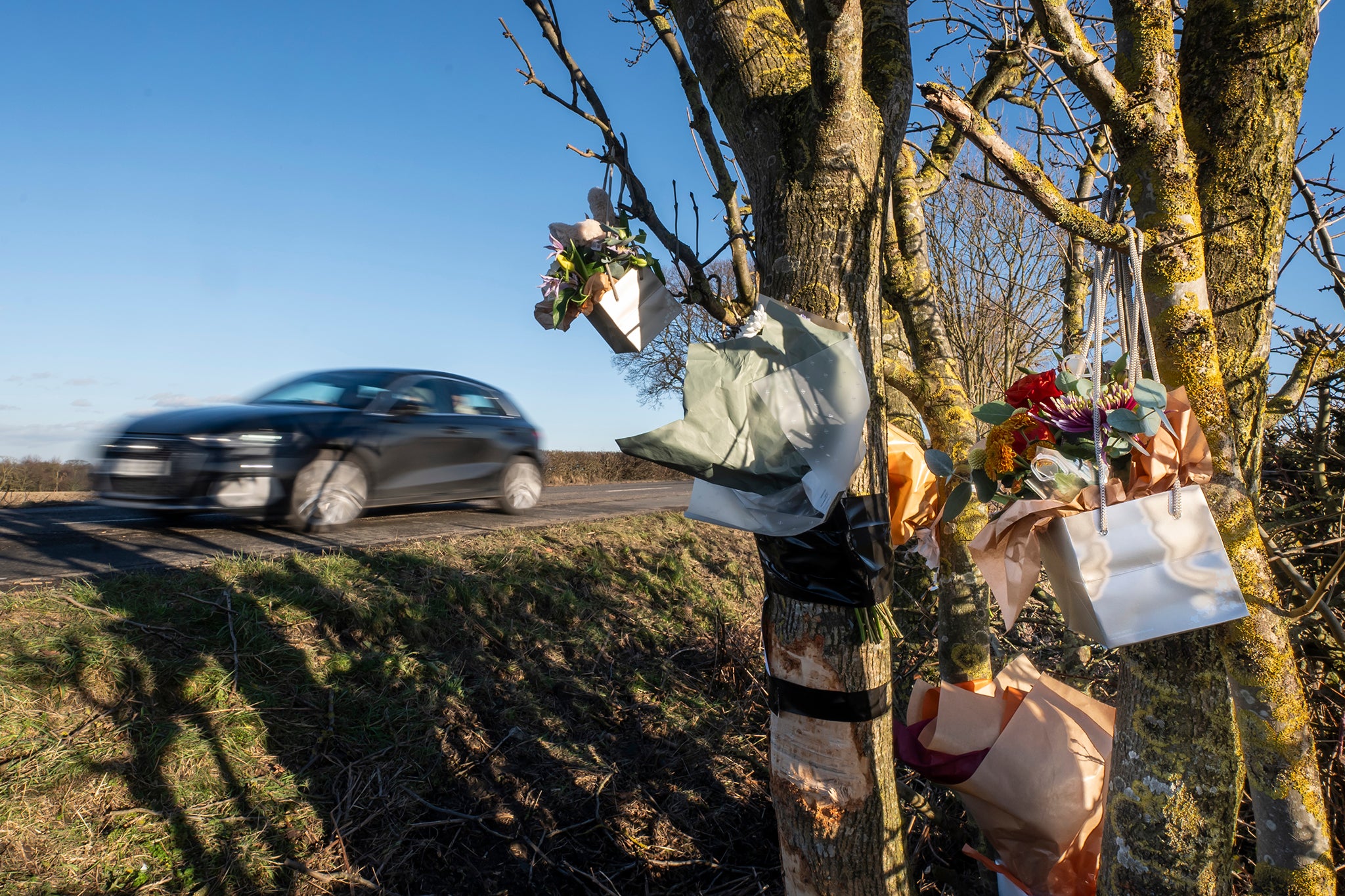 Floral tributes were left on Bramley Lane near Wakefield, West Yorkshire after Friday’s fatal crash