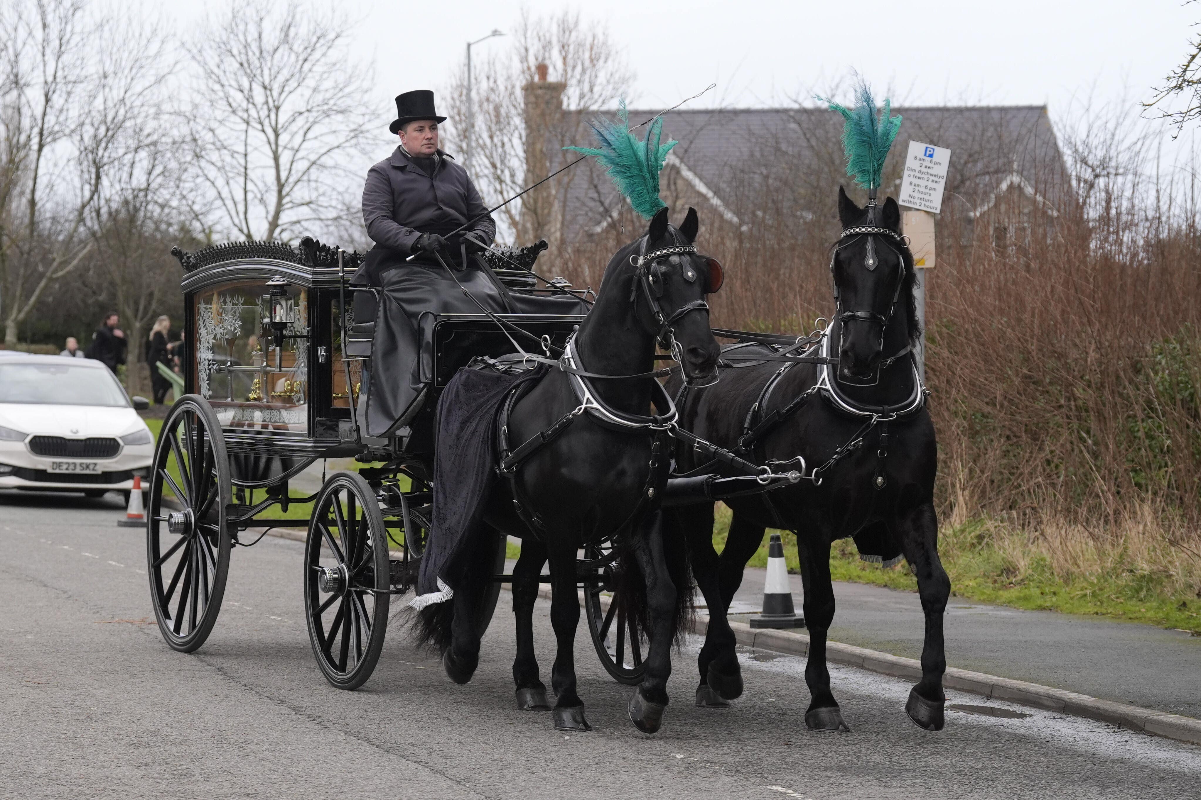 The funeral service for TV star The Vivienne was held at a church in Denbighshire, North Wales