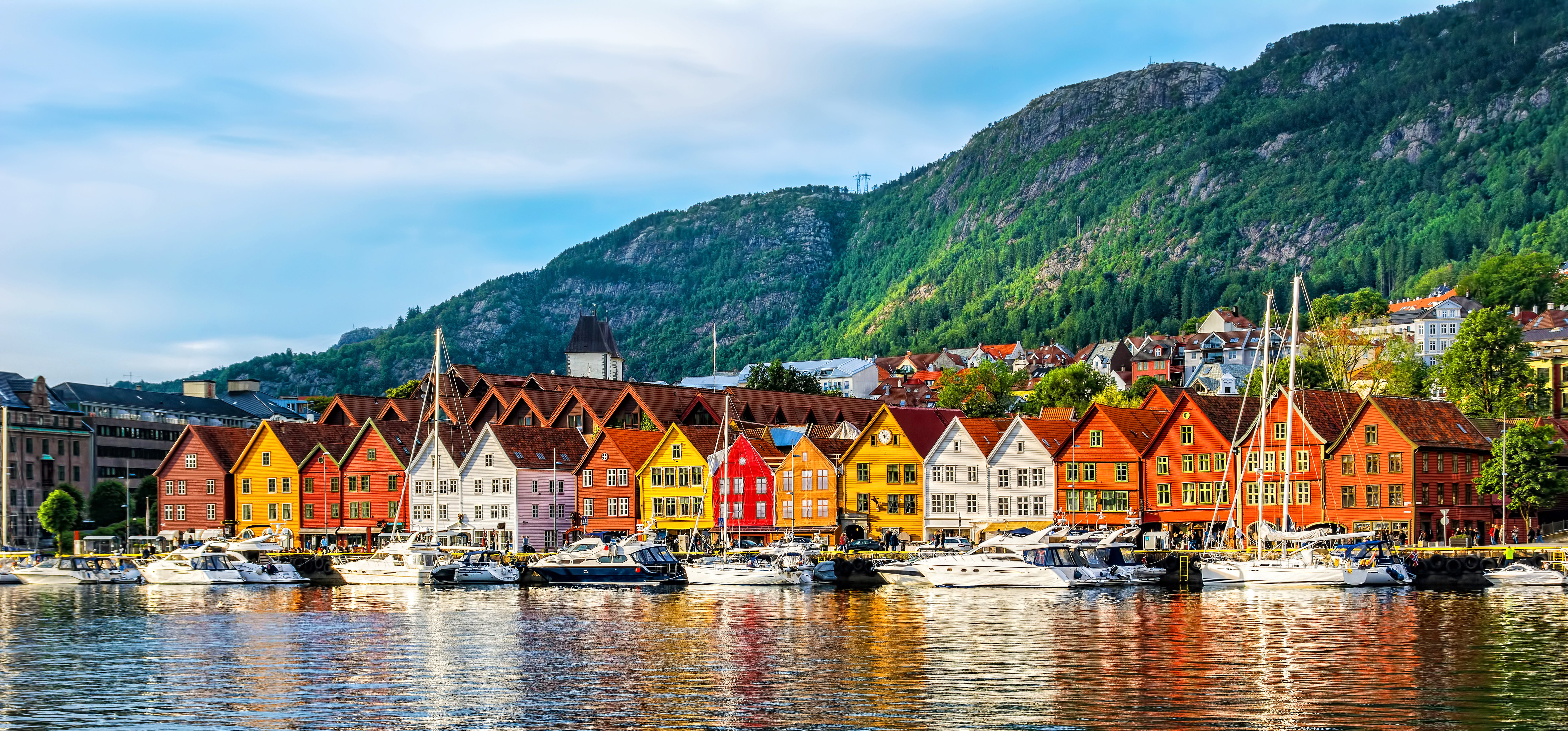 In Bergen, visit the UNESCO World Heritage site, Bryggen where you can meander between colourful wooden buildings dating back to the 12th century