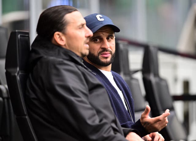 <p>Kyle Walker in conversation with AC Milan's senior advisor Zlatan Ibrahimovic</p>