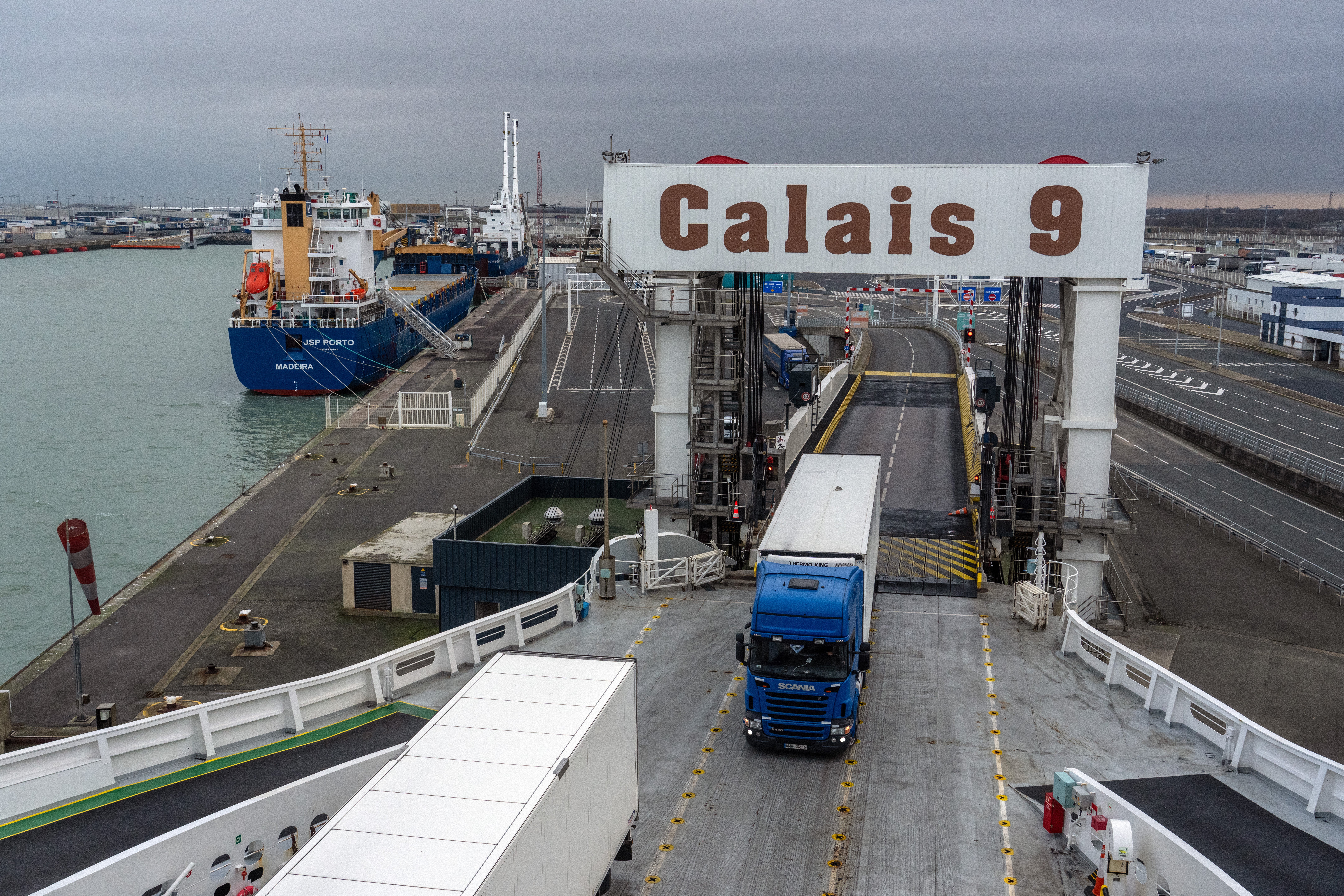 A truck boards a cross-Channel ferry on 21 January last year in Calais
