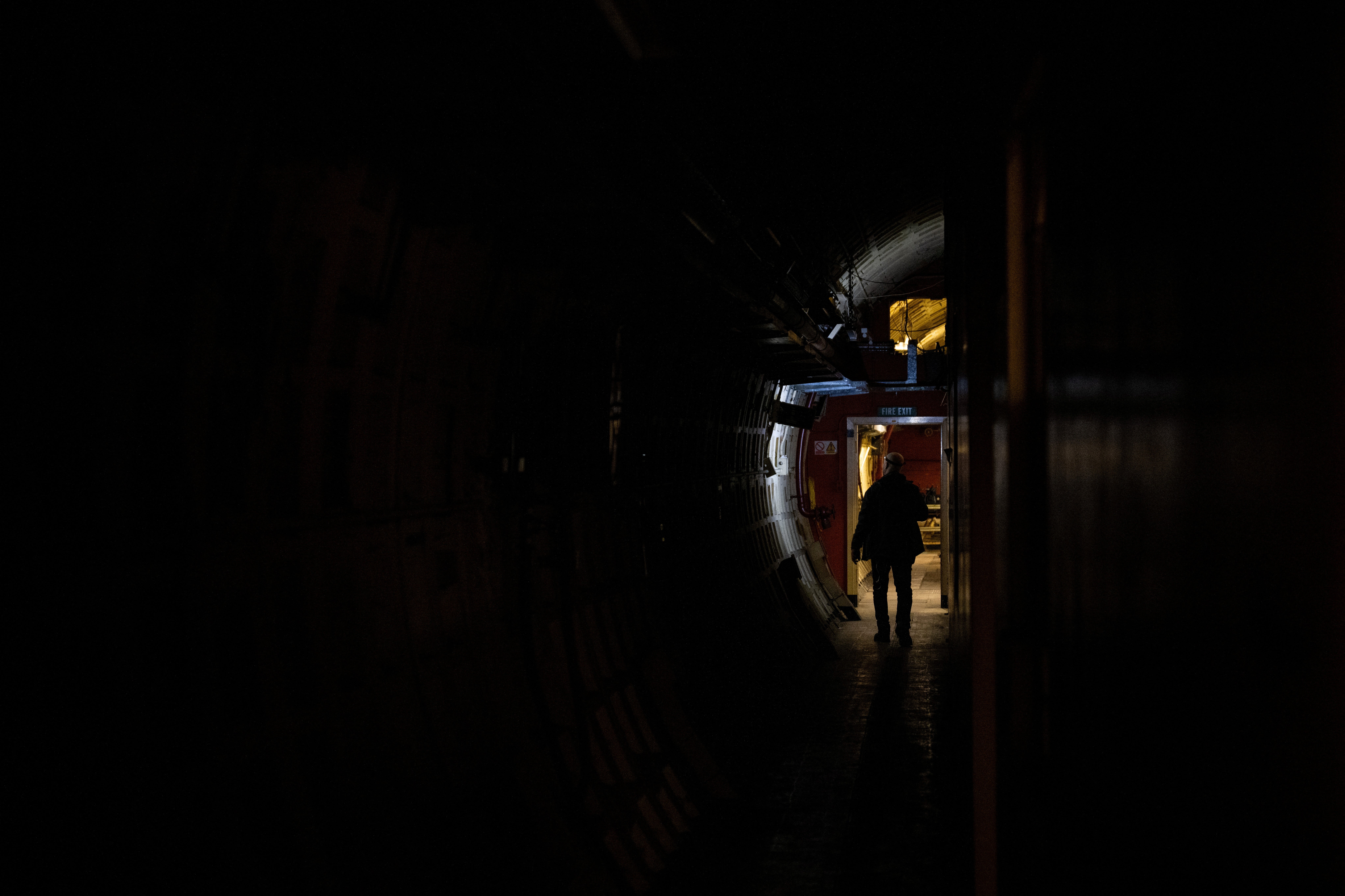 A journalist participates in a press tour of underground tunnels used during World War Two as shelters during the Blitz that are now due to be developed into a new tourist attraction called The London Tunnels