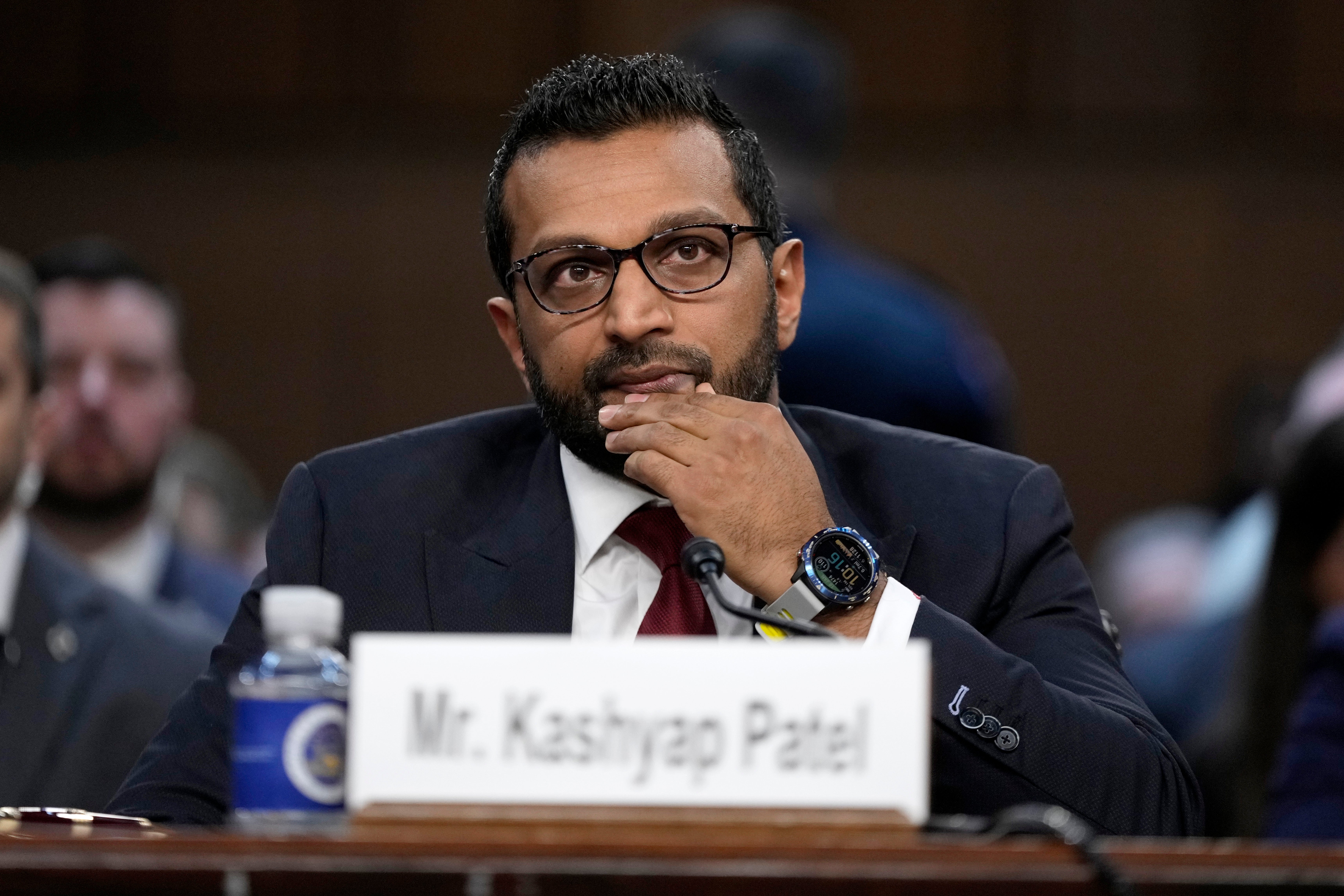 Kash Patel, President Donald Trump's choice to be director of the FBI, listens as Sen. Chuck Grassley, R-Iowa, gives opening statements before Patel's Senate Judiciary Committee confirmation hearing at the Capitol in Washington, Thursday, Jan. 30, 2025. Patel was asked about his appearances on a far-right podcast