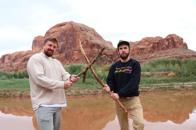 <p>Logan Jugler, left, and Boone Hogg pose with two cool sticks. The pair started the @officialstickreviews account in September 2023</p>