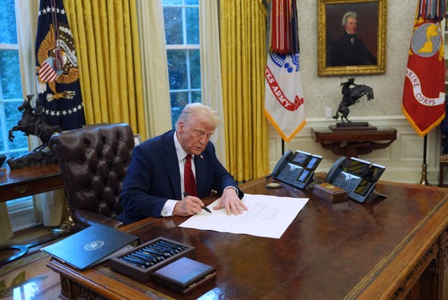 <p>Donald Trump signs an executive order in the Oval Office. He declared February 2025 as National Black History Month, following in the footsteps of every president since 1976</p>