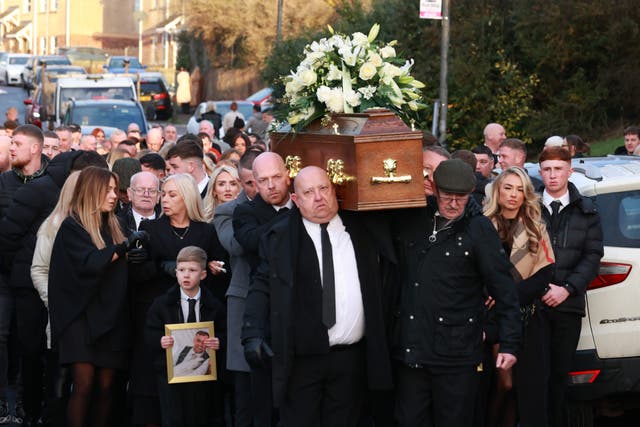 Billy (father front left), Darren (brother second left) and grandfather Joseph Hardy (front right) carry the coffin of murdered Belfast man John George, 37, a father-of-two, also known as John Hardy, as they leave his mother’s home in Belfast for his funeral at St Luke’s Church before burial in Blaris Cemetery, Lisburn. Picture date: Saturday February 1, 2025.