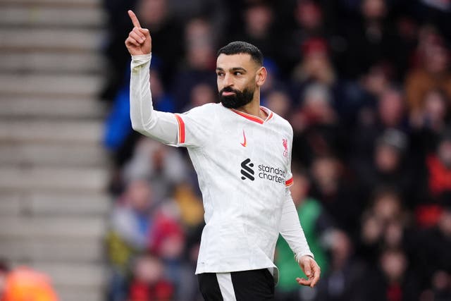 <p>Mo Salah celebrates after scoring Liverpool's opener</p>