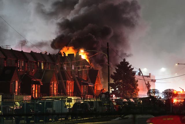 <p>First responders work the scene after a medical plane crashed in Philadelphia</p>