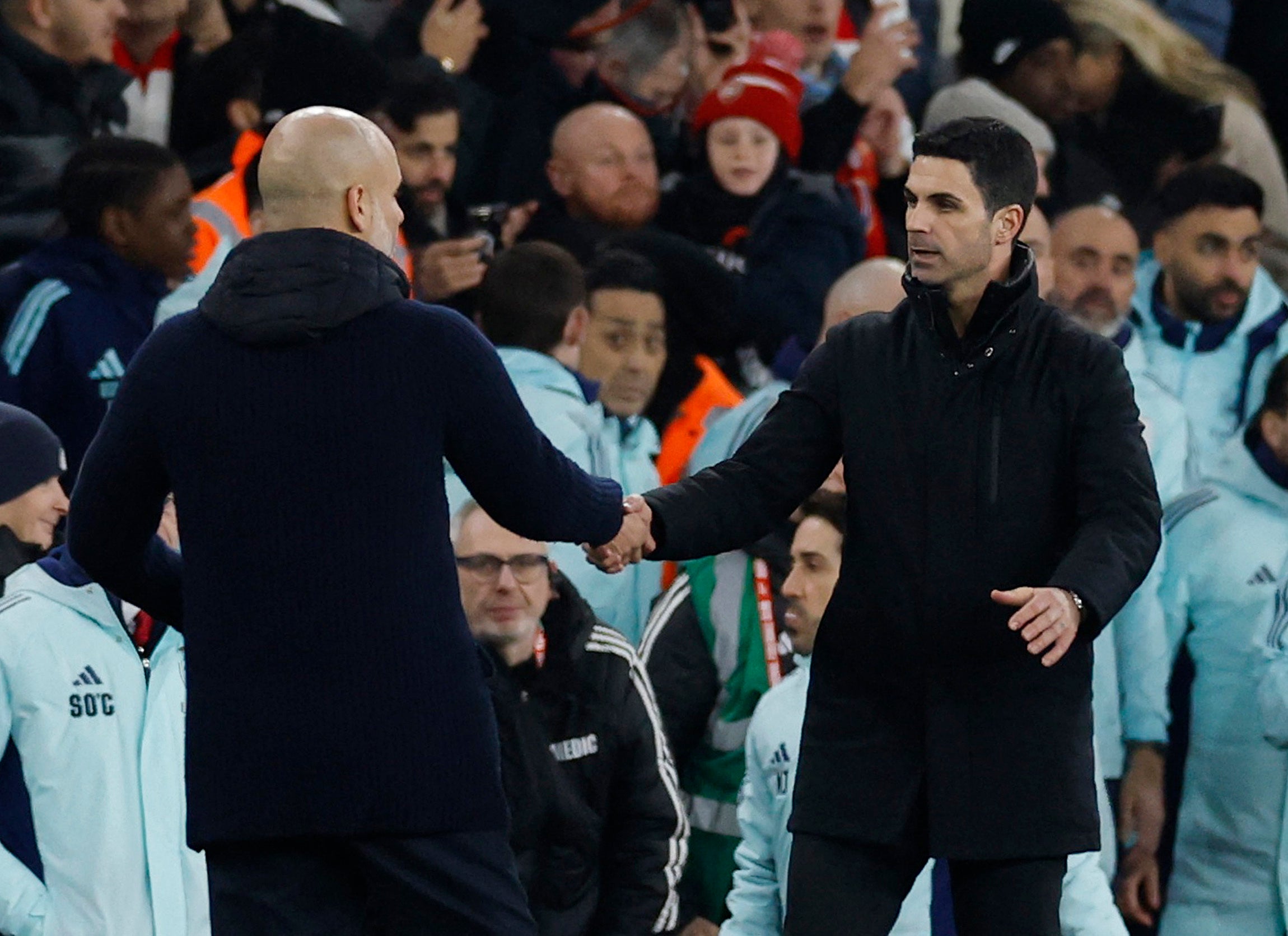 Guardiola, left, and Arteta after the match