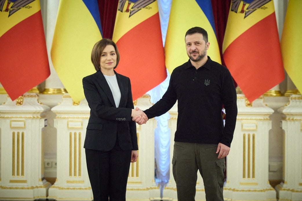 Ukraine’s president Volodymyr Zelensky shakes hands with Moldova’s president Maia Sandu. Moldova, which is occupied by Russian troops, is not a Nato member