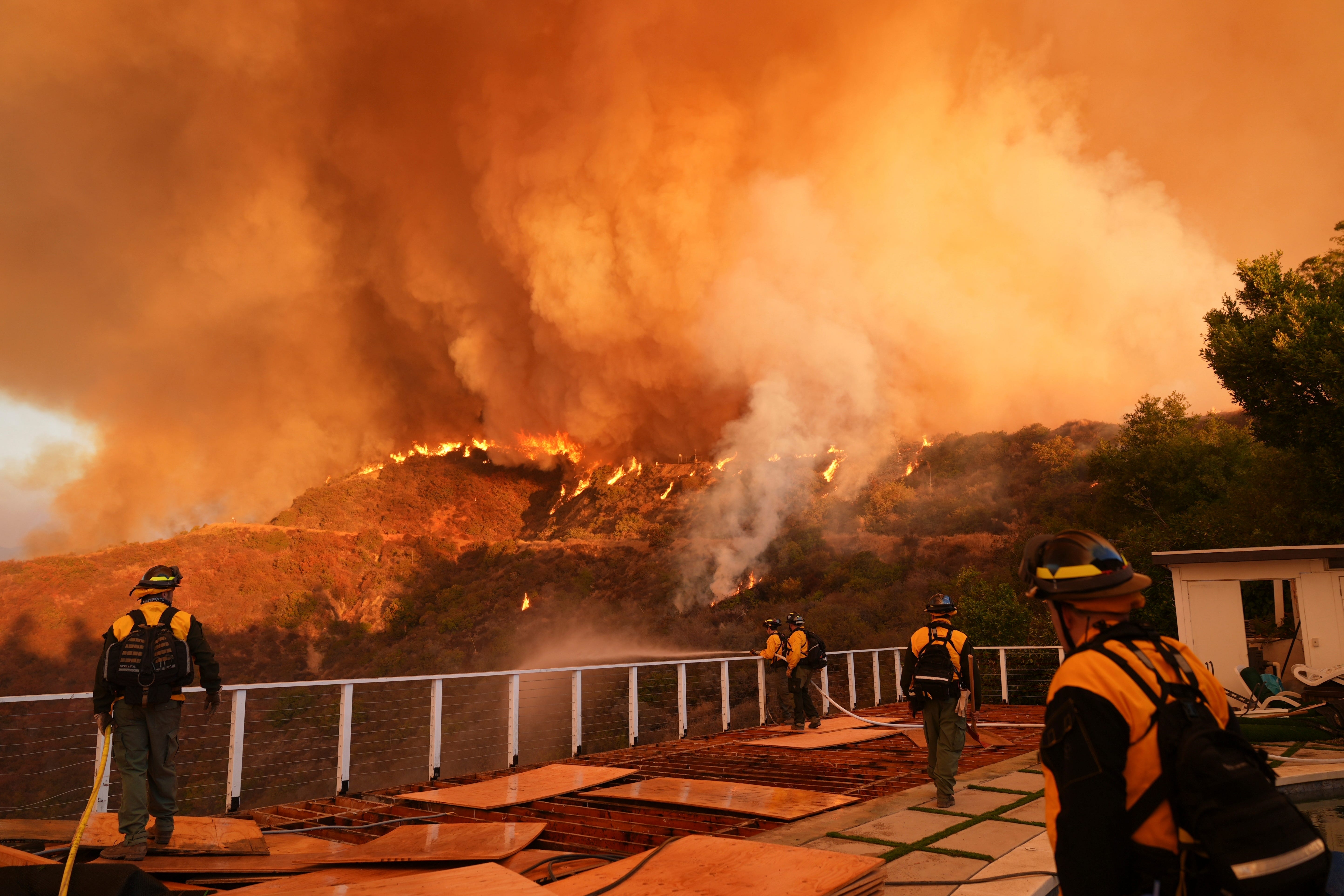Fire crews monitor the Palisades Fire in Mandeville Canyon, California (Jae C Hong/AP photo)