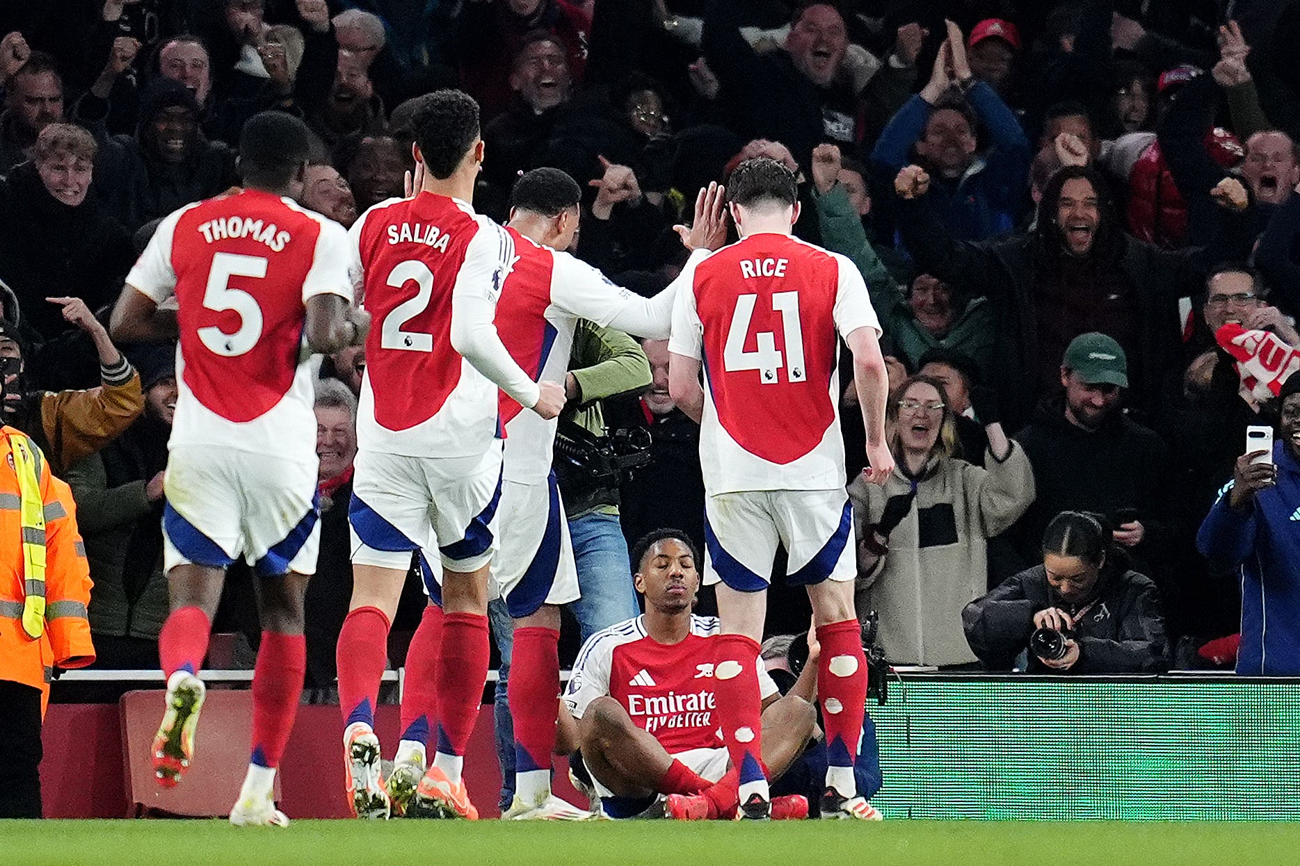 Myles Lewis-Skelly mimics Erling Haaland’s celebration (Adam Davy/PA)