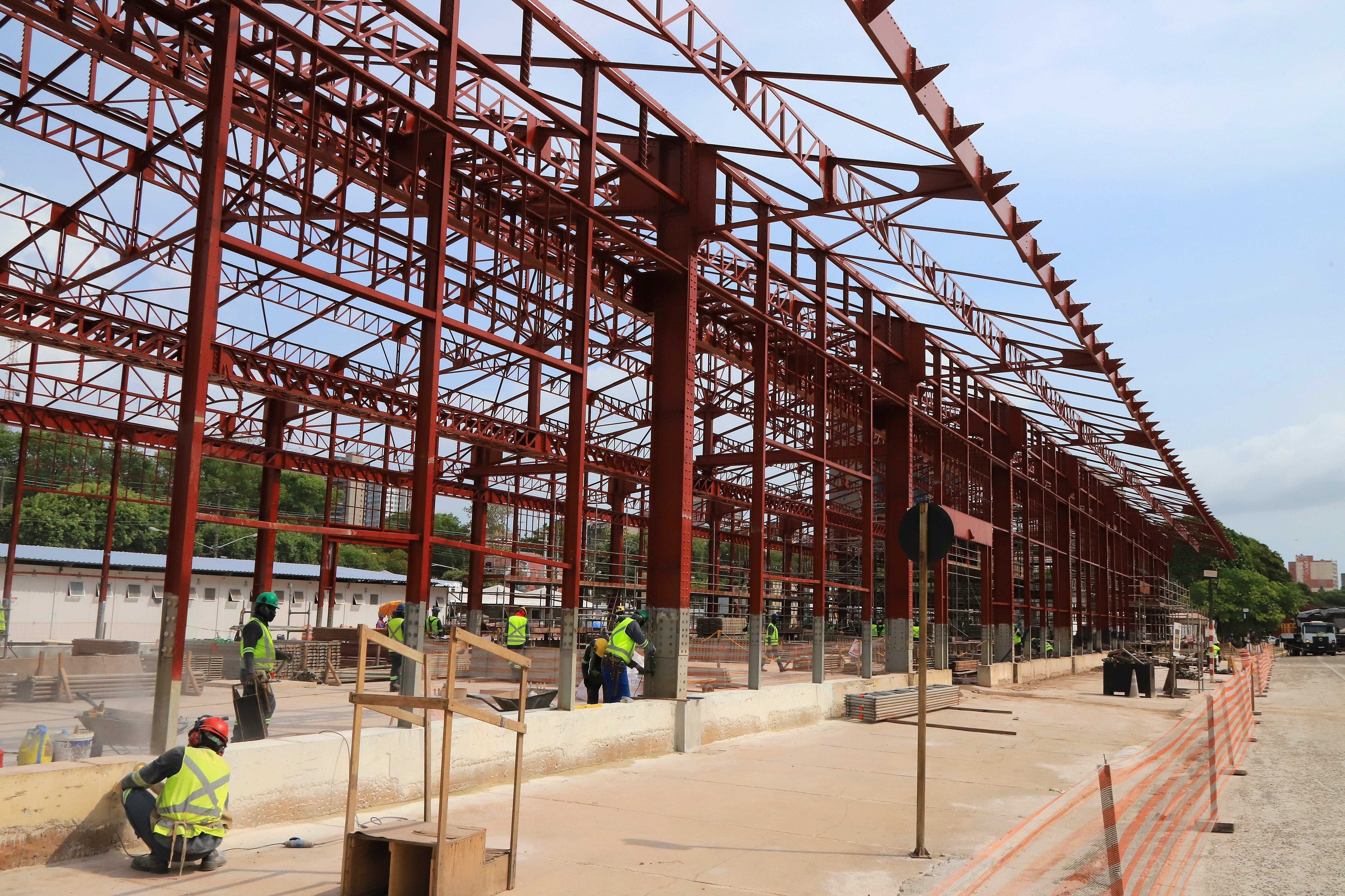 FILE - Construction workers make progress in Belem, Brazil, Sept. 24, 2024, on a project for the COP30 U.N. Climate Summit. (AP Photo/Paulo Santos, File)