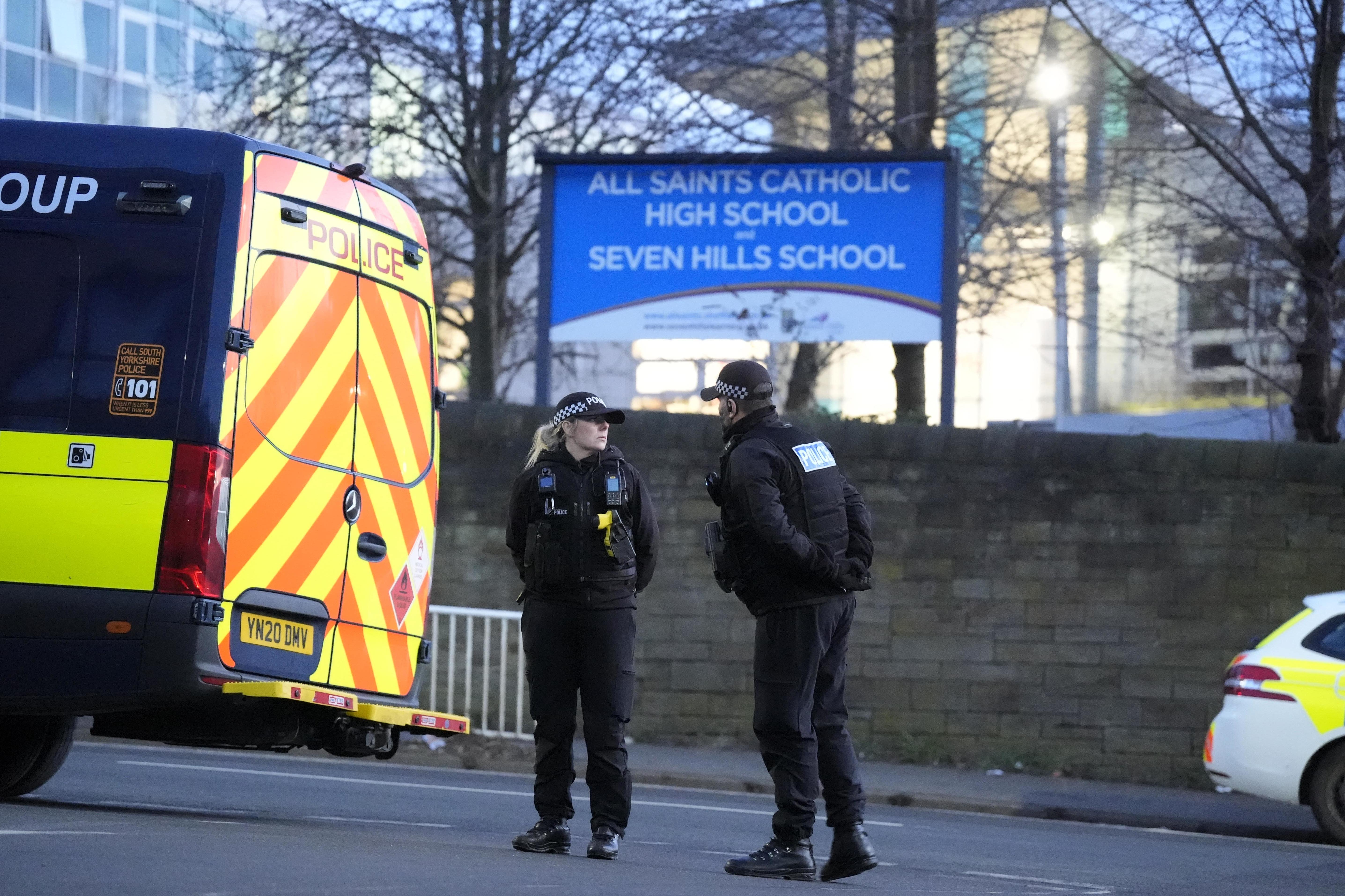 Police officers outside All Saints Catholic High School, on Granville Road in Sheffield (Danny Lawson/PA)