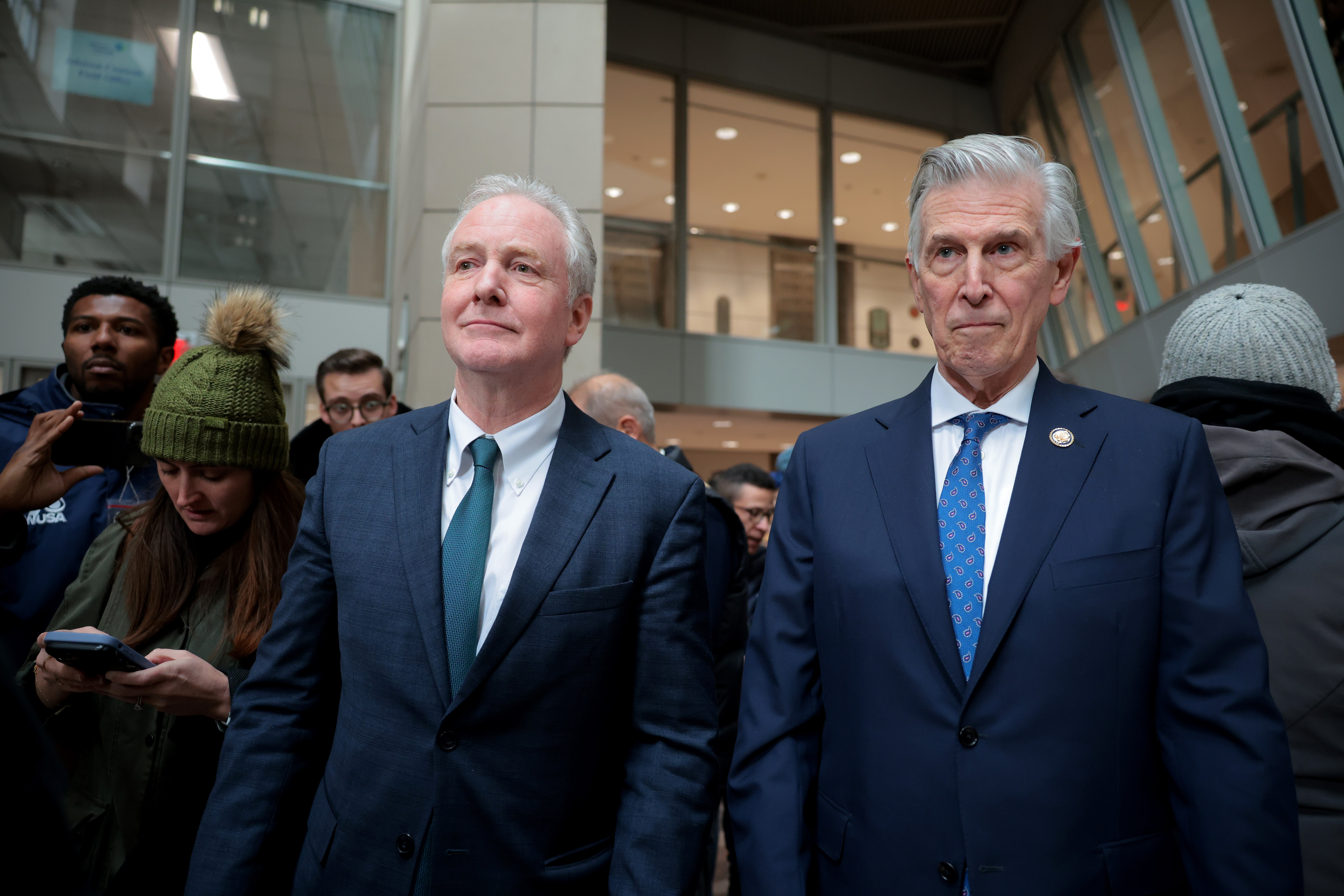 U.S. Rep. Don Beyer (D-VA) (R) and Sen. Chris Van Hollen (D-MD) were among those protesting efforts to dismantle USAID