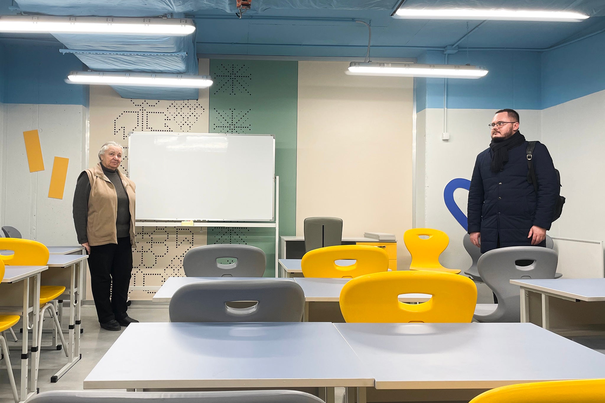 Headteacher Valentyna Yerashova, left, with MP Oleksandr Vasiuk at the new underground school in Zaporizhzhia
