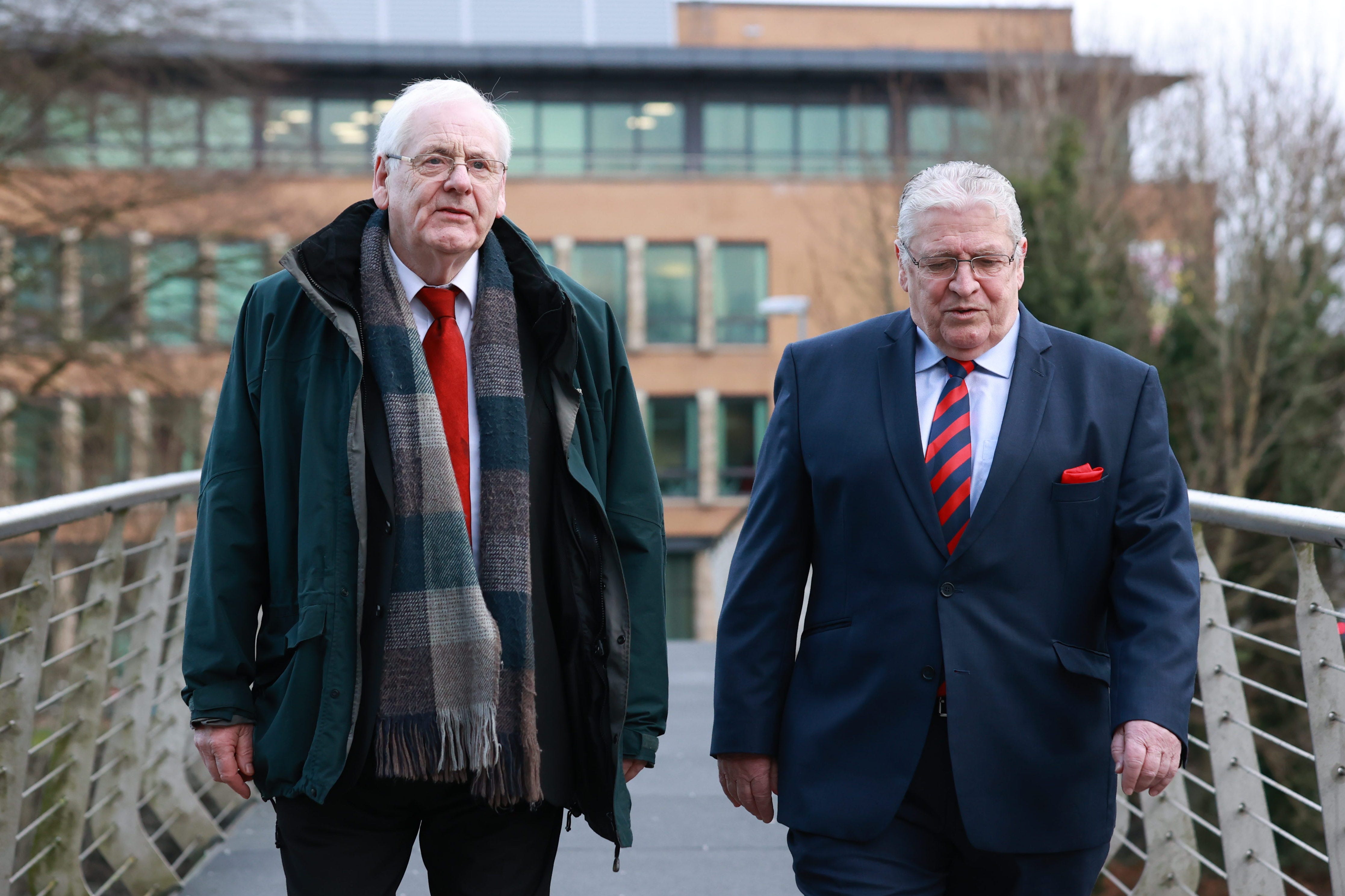 Michael Gallagher (left), the father of Aiden Gallagher, one of the victims of the Omagh bombing, arrives at the Strule Arts Centre in Omagh, Co Tyrone with Stanley McCombe (right), the husband of Ann McCombe, another victim of the bombing (PA)