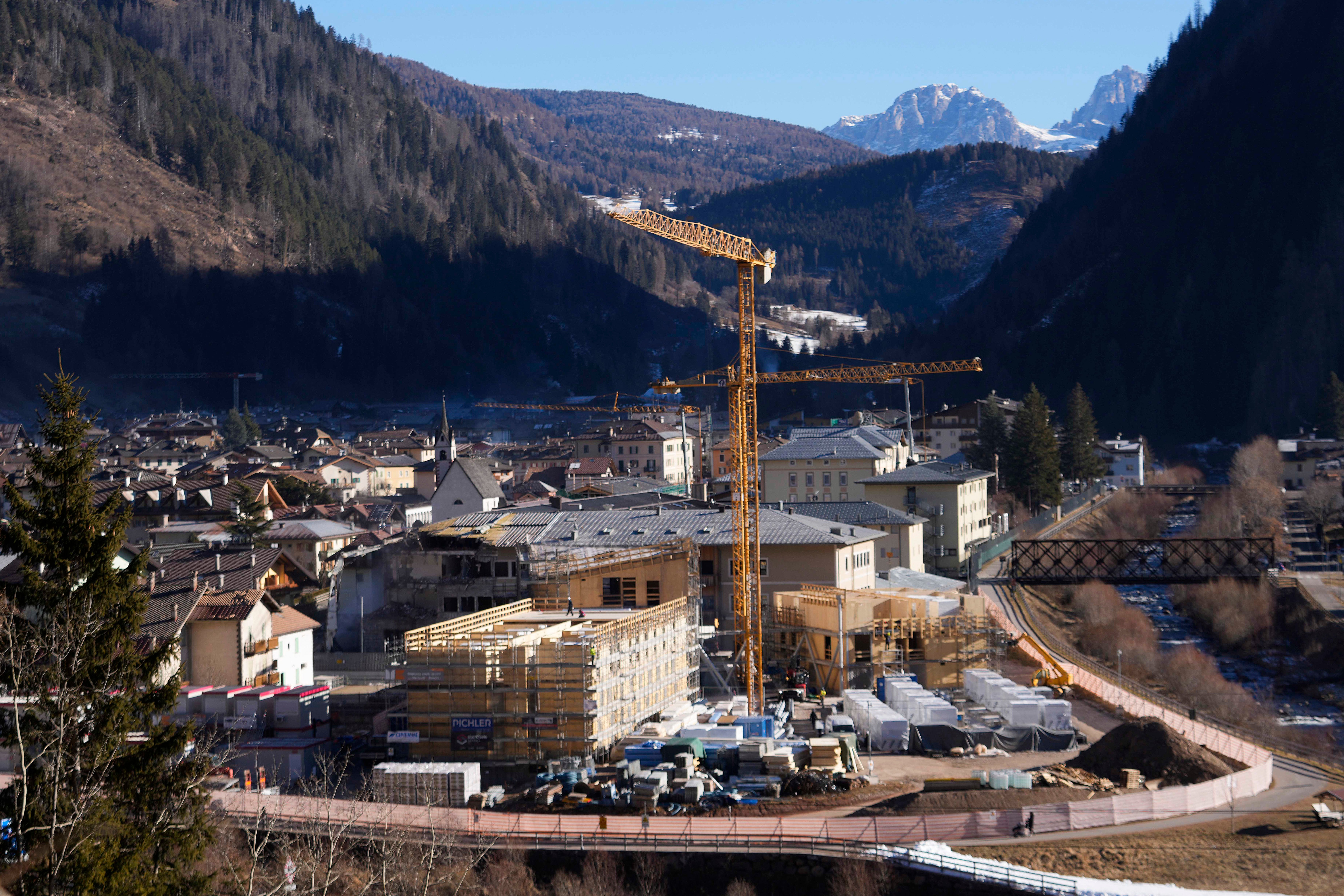 The venue for the ski jumping and Nordic combined disciplines under construction for the 2026 Winter Olympics in Predazzo, Italy
