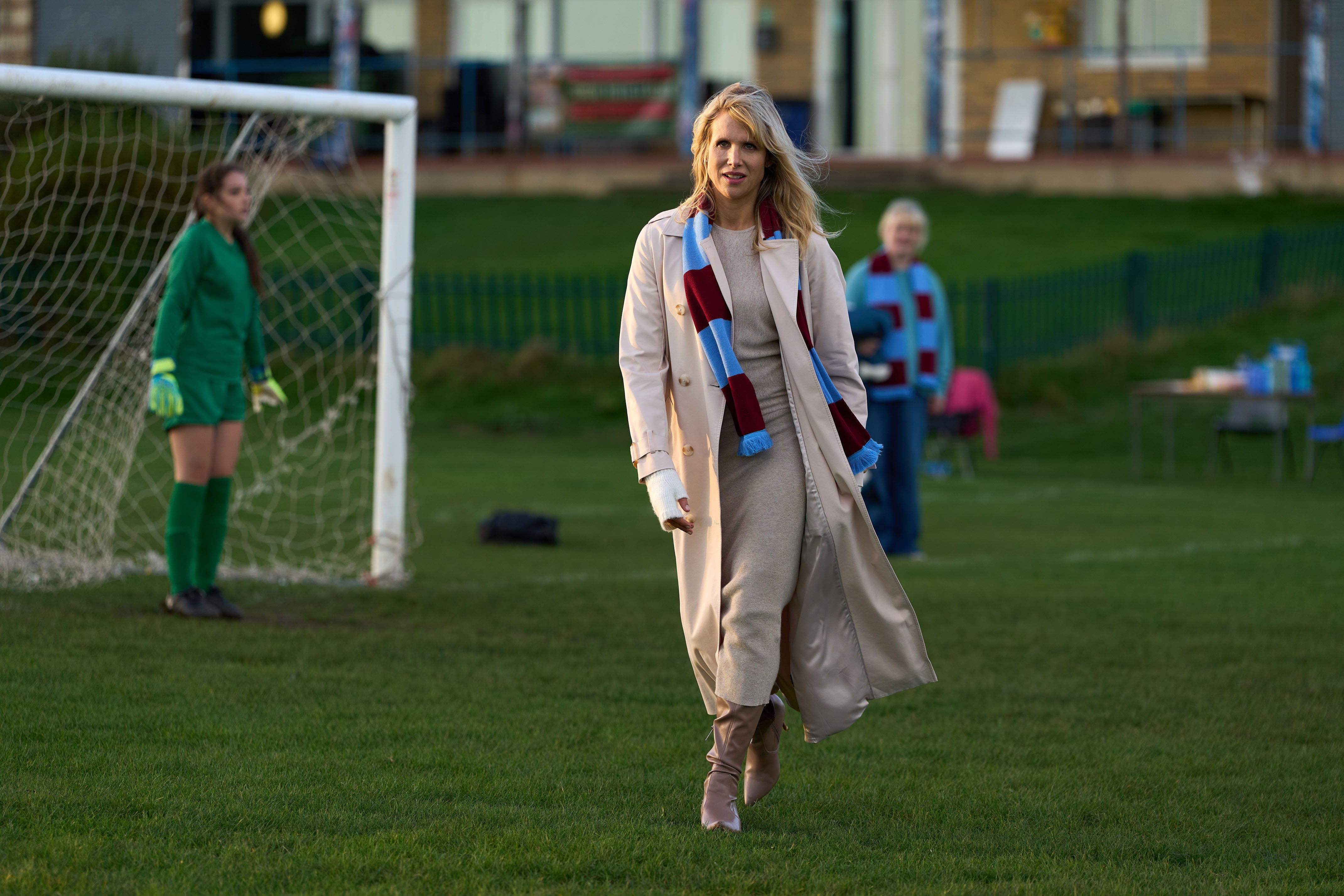 You can only imagine Amanda’s horror at having to ruin one of her beige outfits with a football scarf