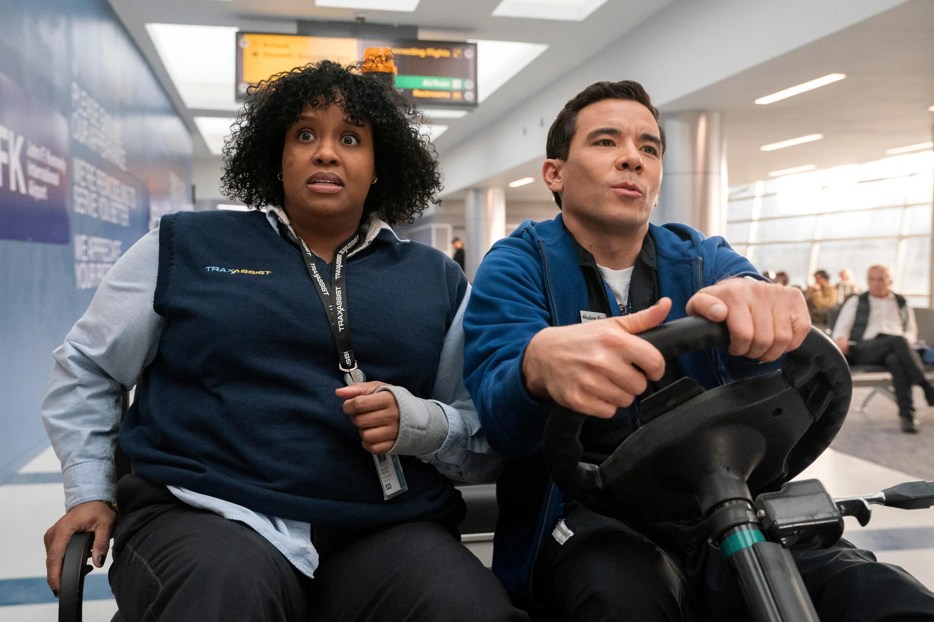 Rothwell and Conrad Ricamora in the JFK airport-set comedy 'How to Die Alone'