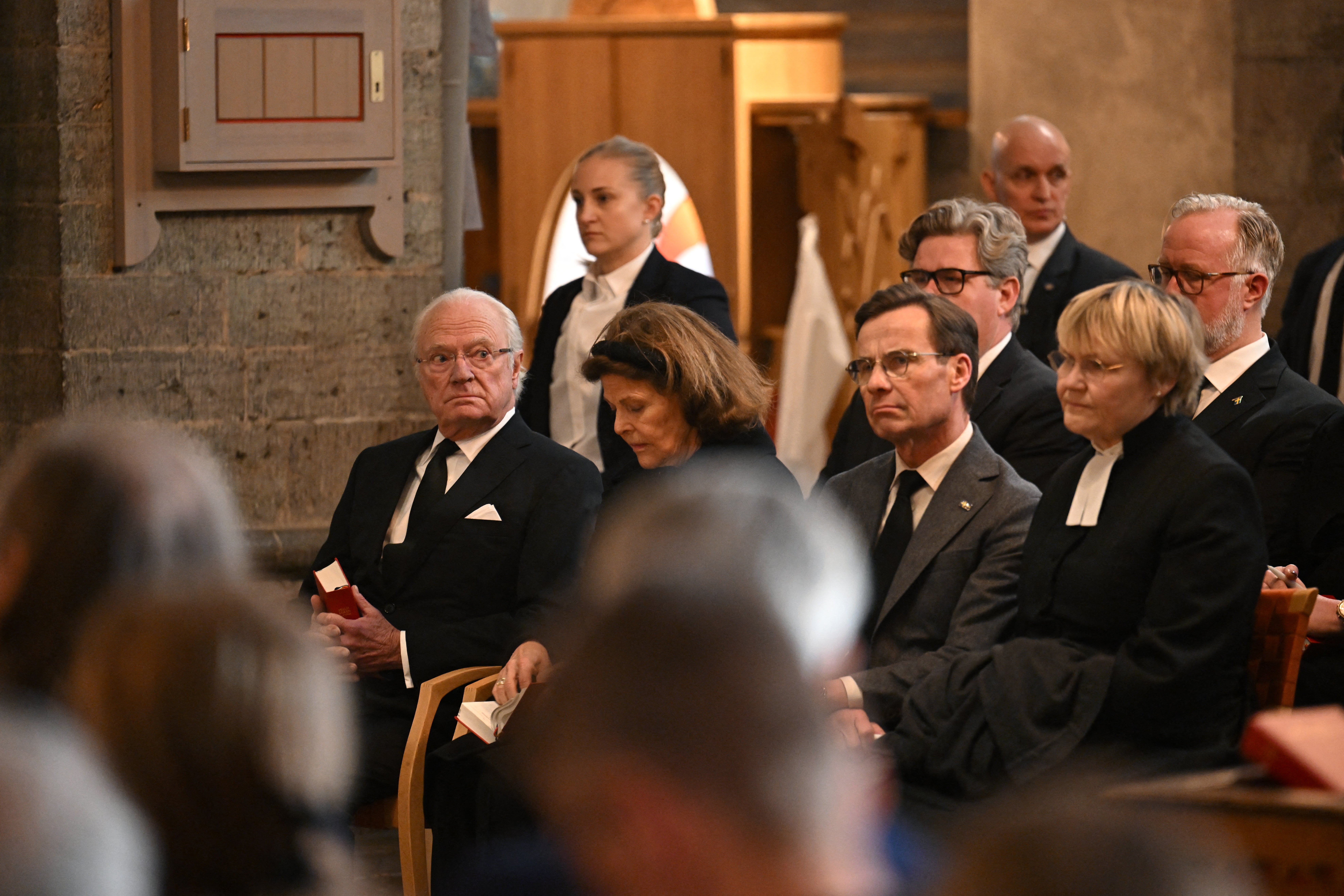 The King and Queen were joined by prime minister Ulf Kristersson and his wife Birgitta Ed at a memorial service in a nearby church