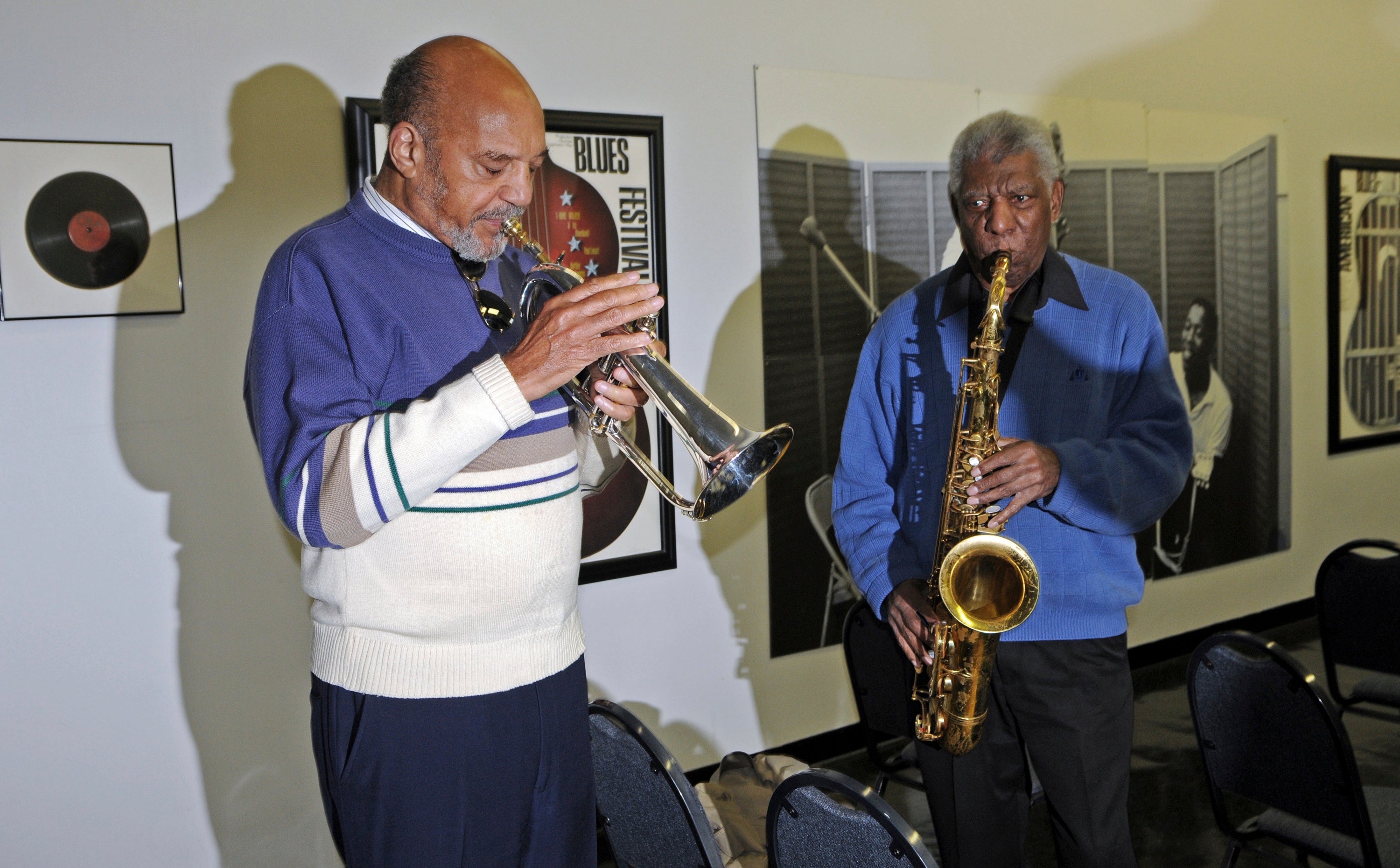 Trumpeter Art Hoyle, left, and saxophonist Gene Barge demonstrate the sounds of their instruments at Chess Recording Studio in 2011