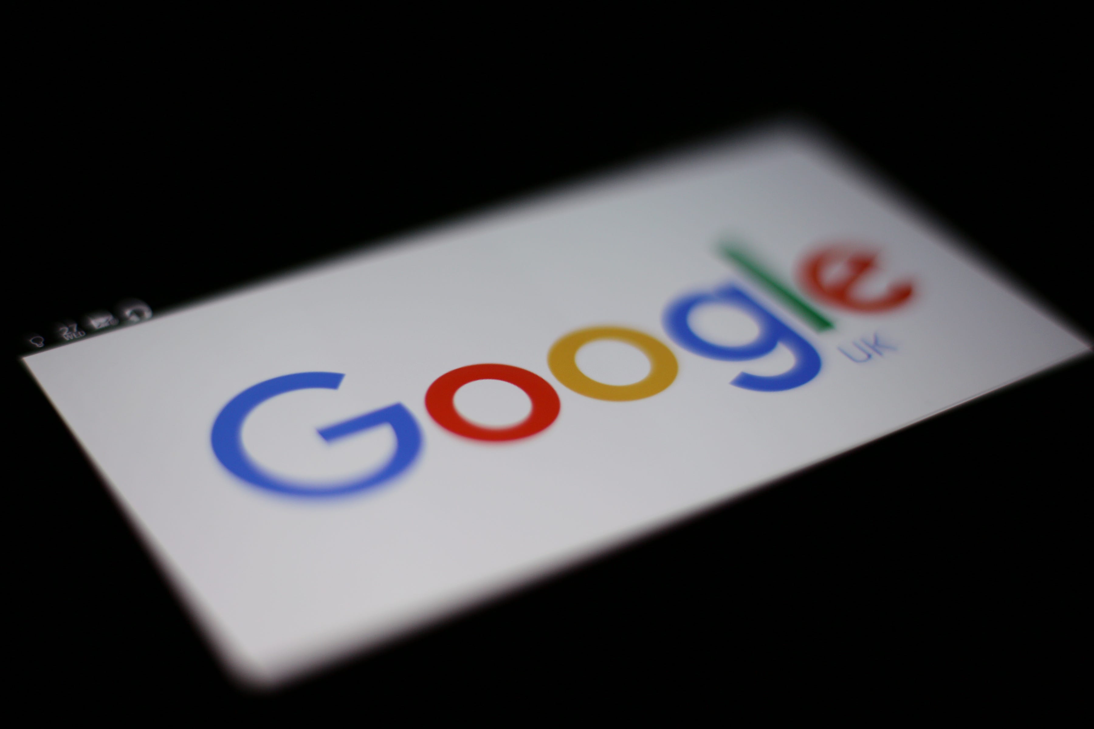 A Google logo on the screen of a mobile phone, in London (Yui Mok/PA)