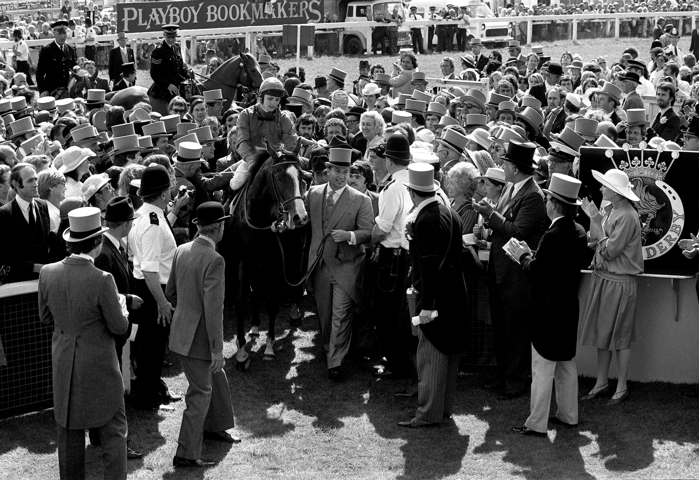 The Aga Khan leads Shergar into the unsaddling enclosure at Epsom, 1981