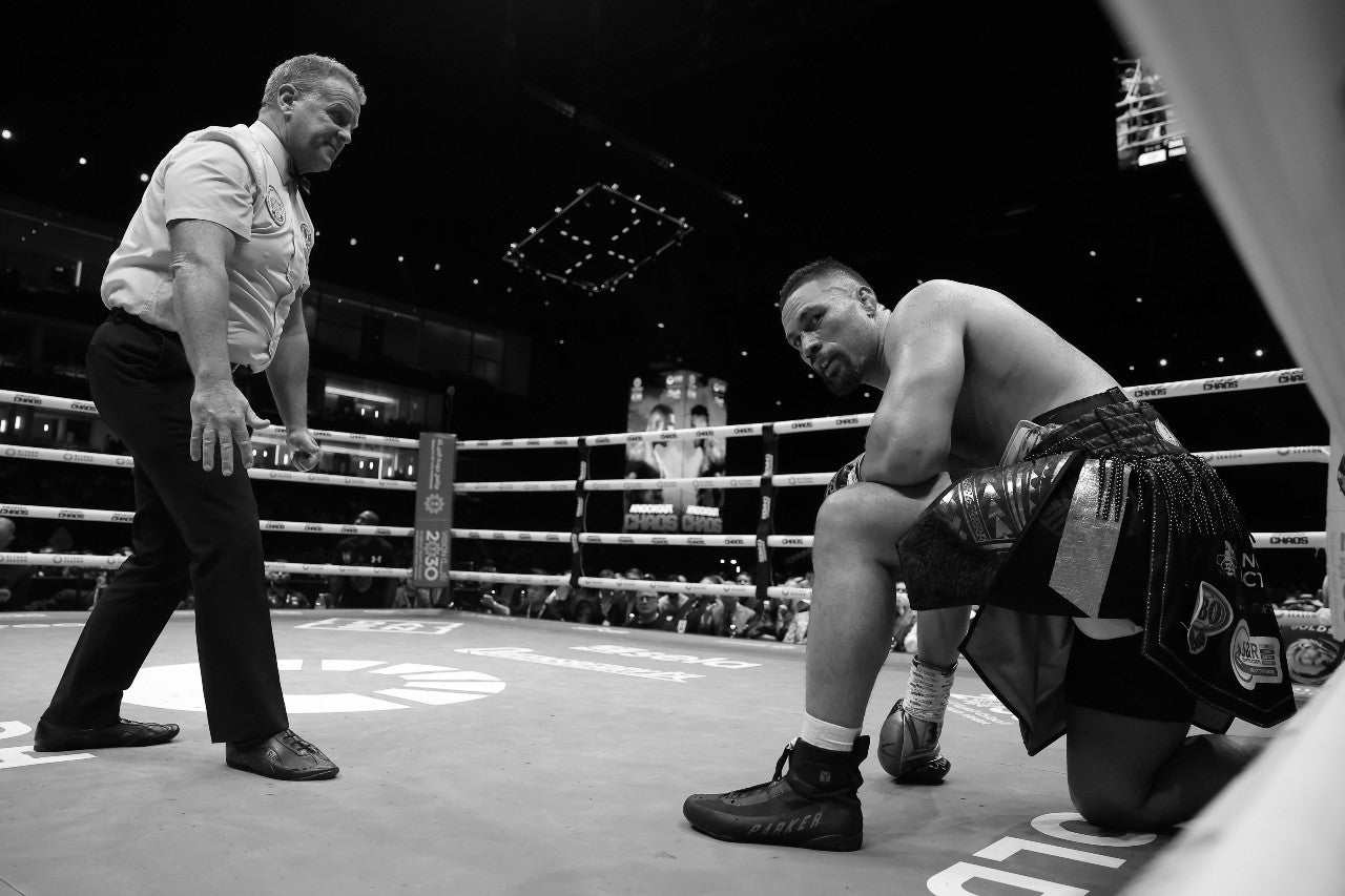 Parker had to climb off the canvas twice to beat Zhilei Zhang