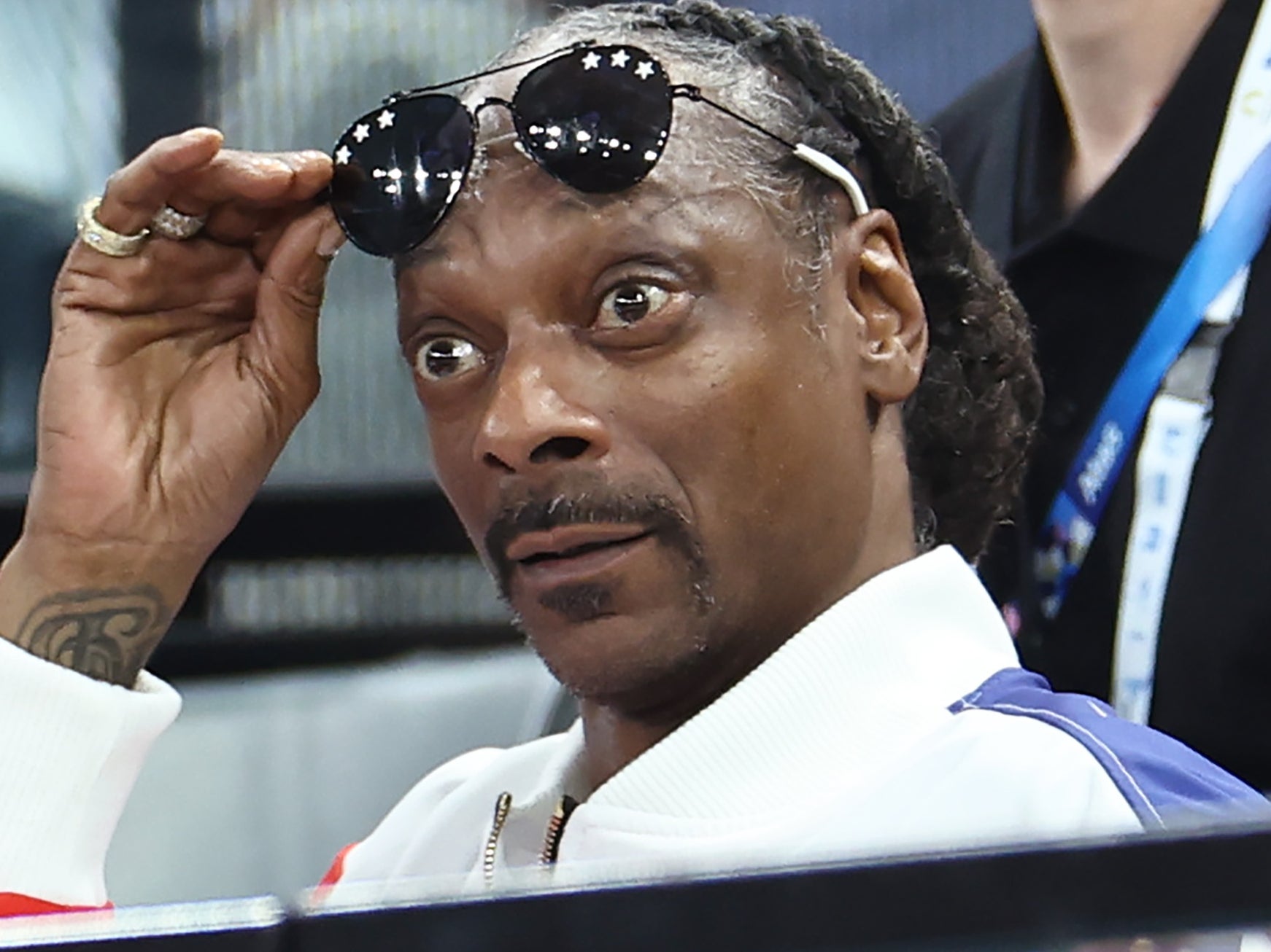 PARIS, FRANCE - JULY 28: Snoop Dogg (R) attends the Artistic Gymnastics Women's Qualification on day two of the Olympic Games Paris 2024 at Bercy Arena on July 28, 2024 in Paris, France. (Photo by Arturo Holmes/Getty Images)