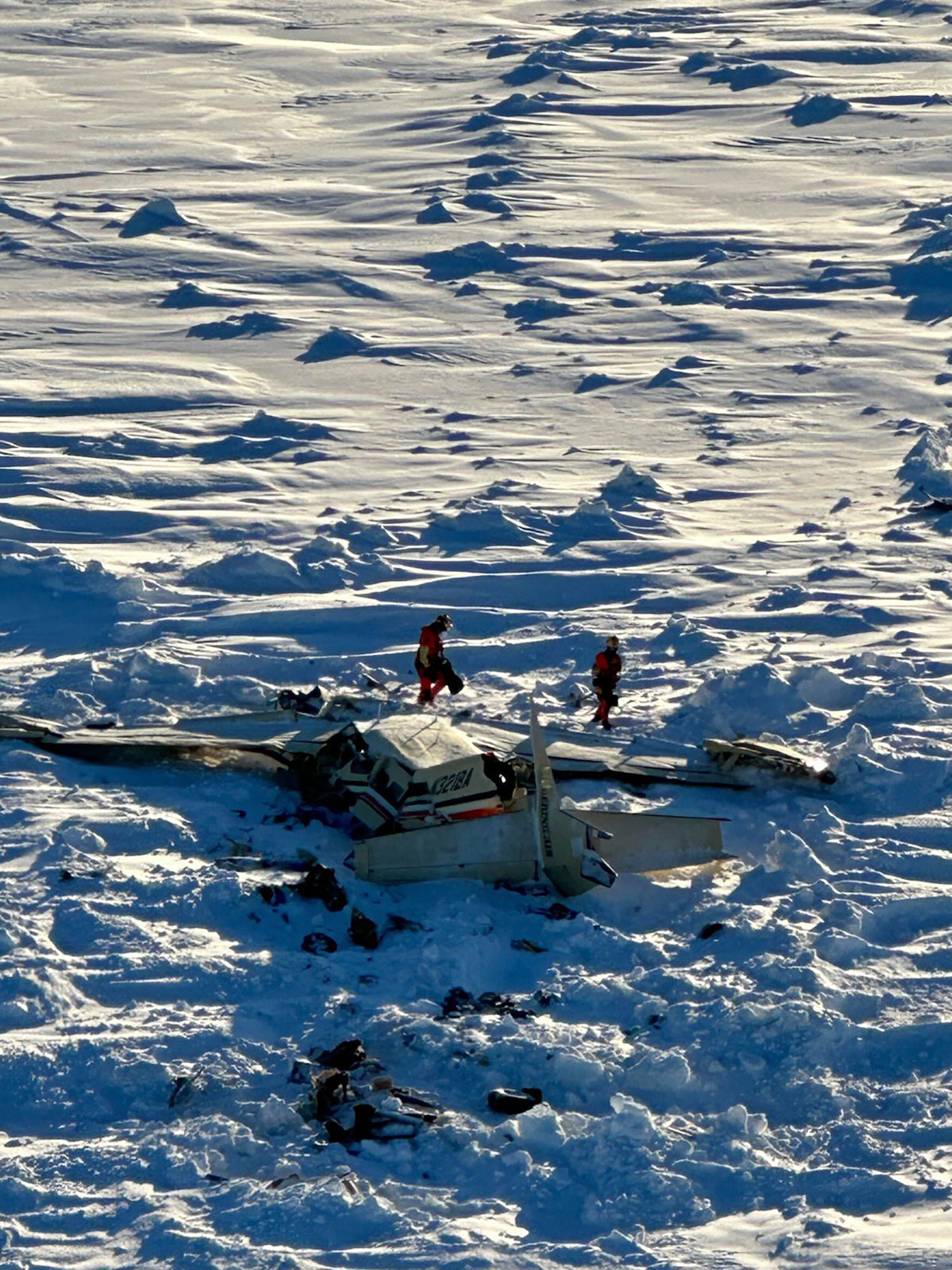 This photo provided by the U.S. Coast Guard on Friday, Feb. 7, 2025, shows a small commuter plane that crashed in western Alaska on a flight that was bound for the hub community of Nome