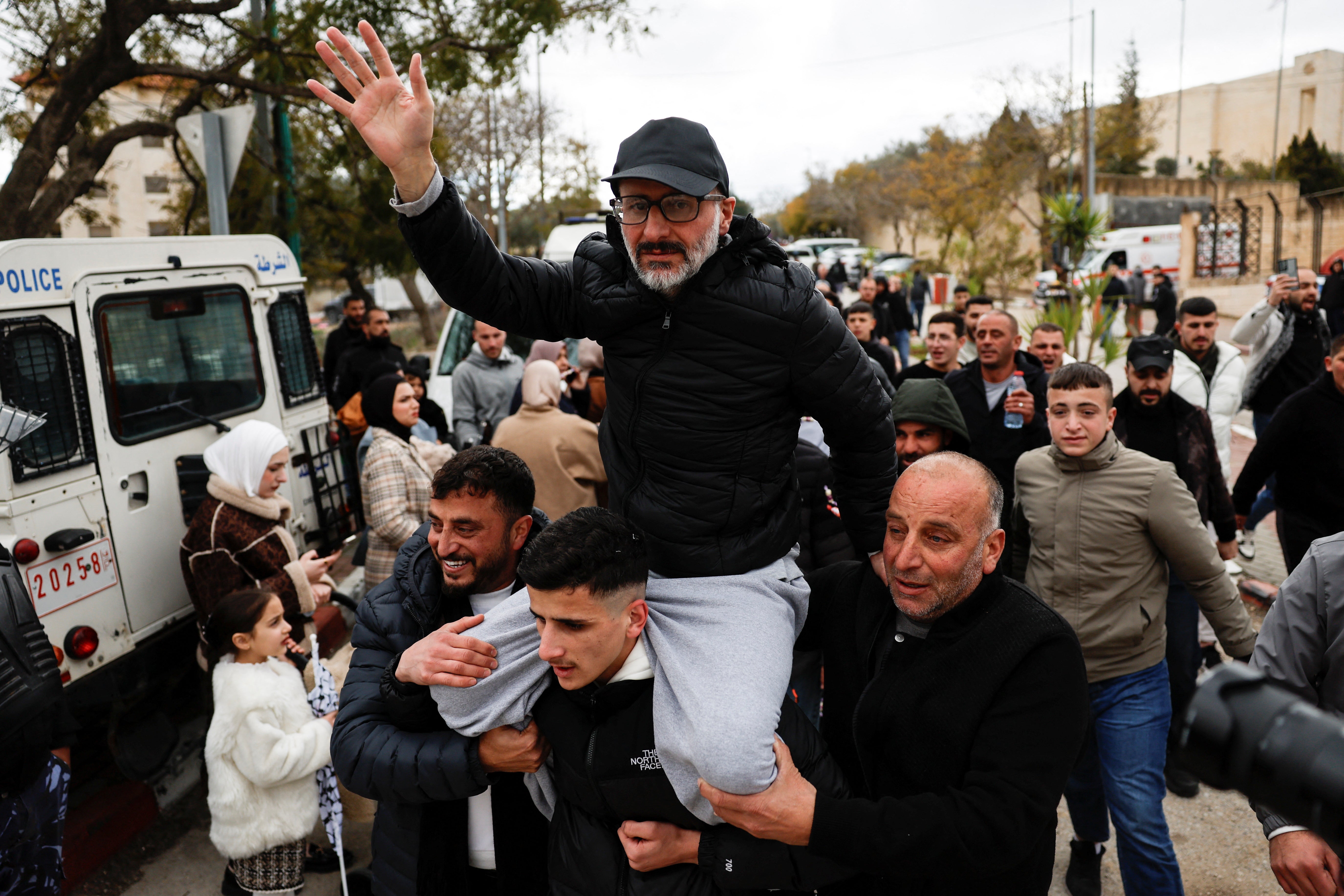 Eyad Abu Shkaidem, a freed Palestinian prisoner, is carried as he is greeted by people after being released from an Israeli jail as part of a hostages-prisoners swap at the weekend