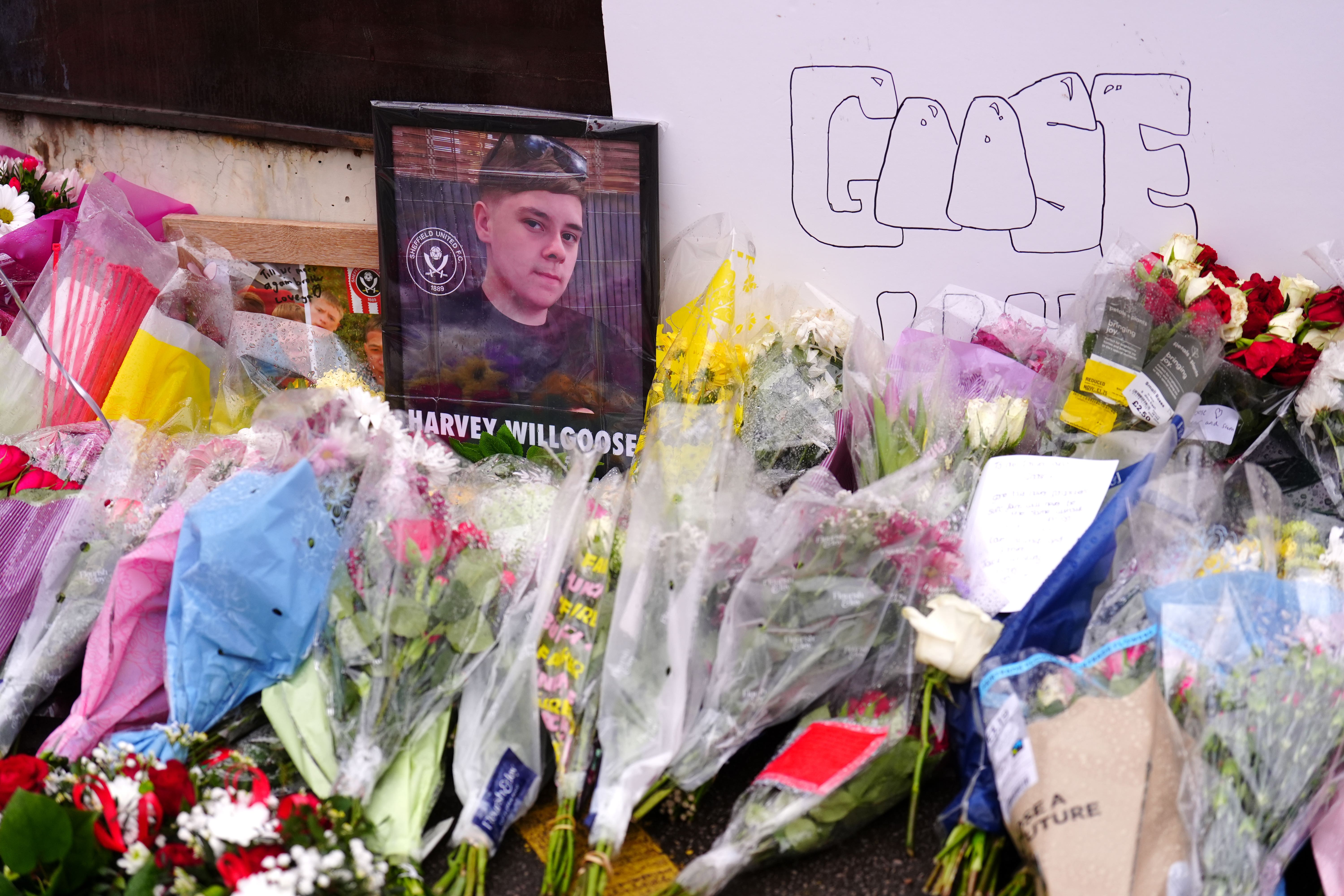 Tributes to Harvey Willgoose on the gates outside Sheffield United’s stadium in Bramall Lane (Mike Egerton/PA)