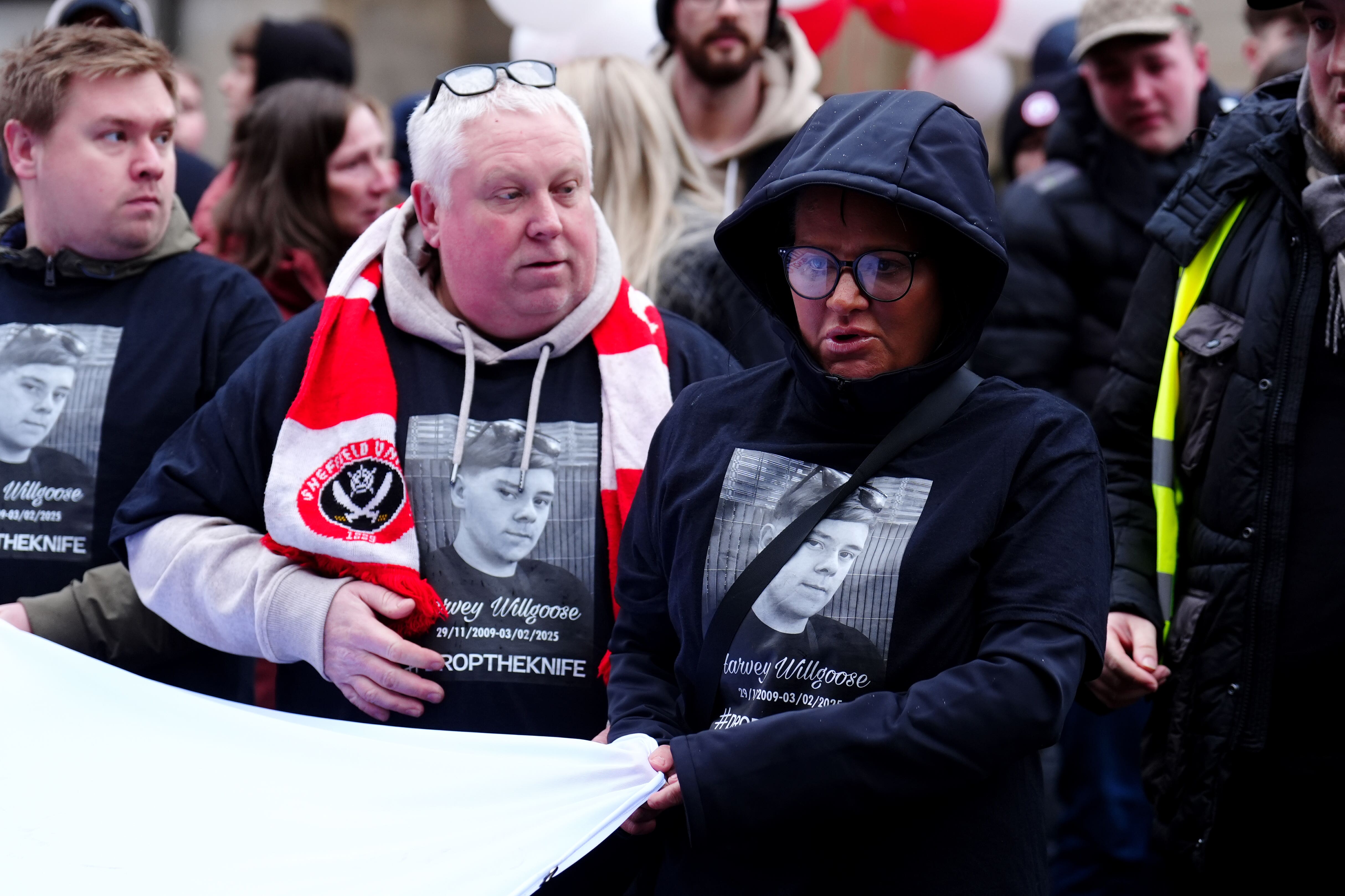 Harvey Willgoose’s parents Mark (left), and Caroline Willgoose led the march through Sheffield (Mike Egerton/PA)