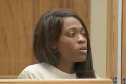 Nora Nelson appears in Massachusetts court on Friday, where she faced murder charges for the death of 65-year-old Joseph Donohue. She has pleaded not guilty