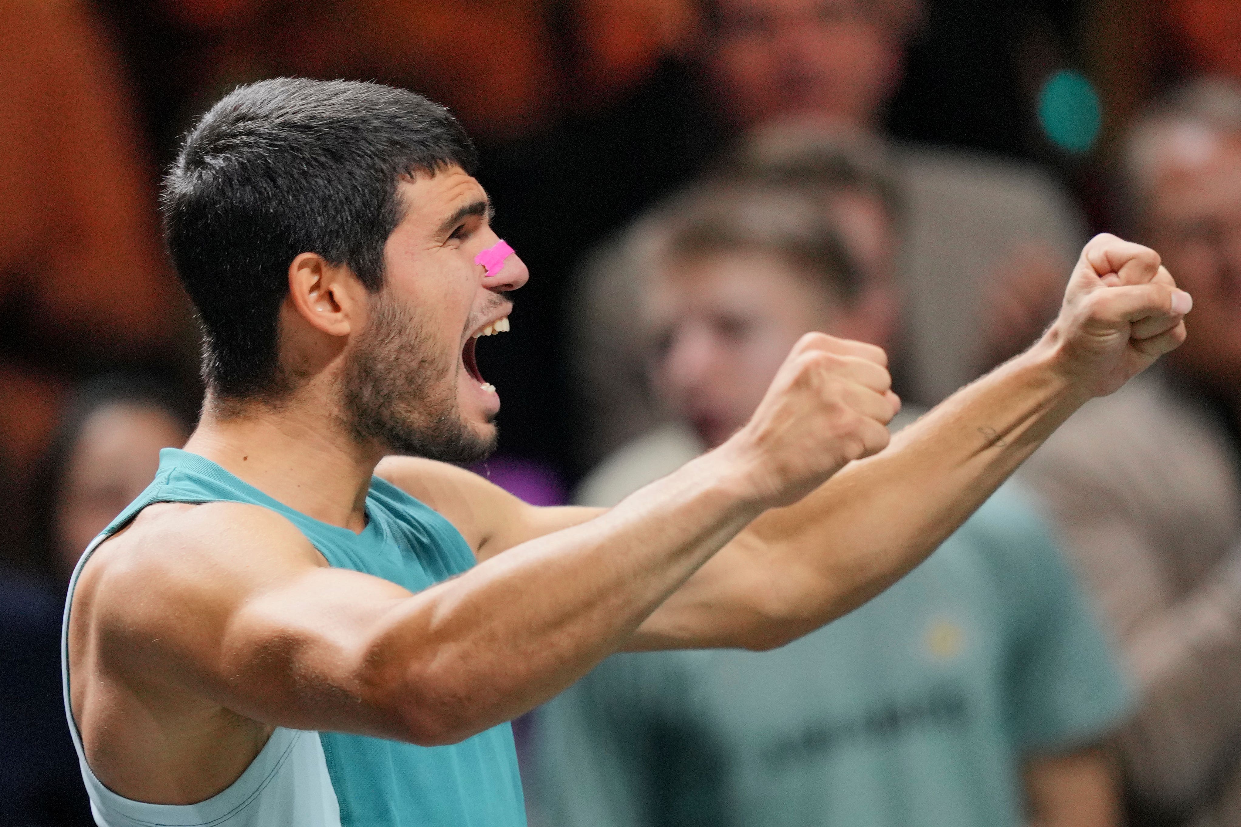 Carlos Alcaraz celebrates his title in Rotterdam (Peter Dejong/AP)