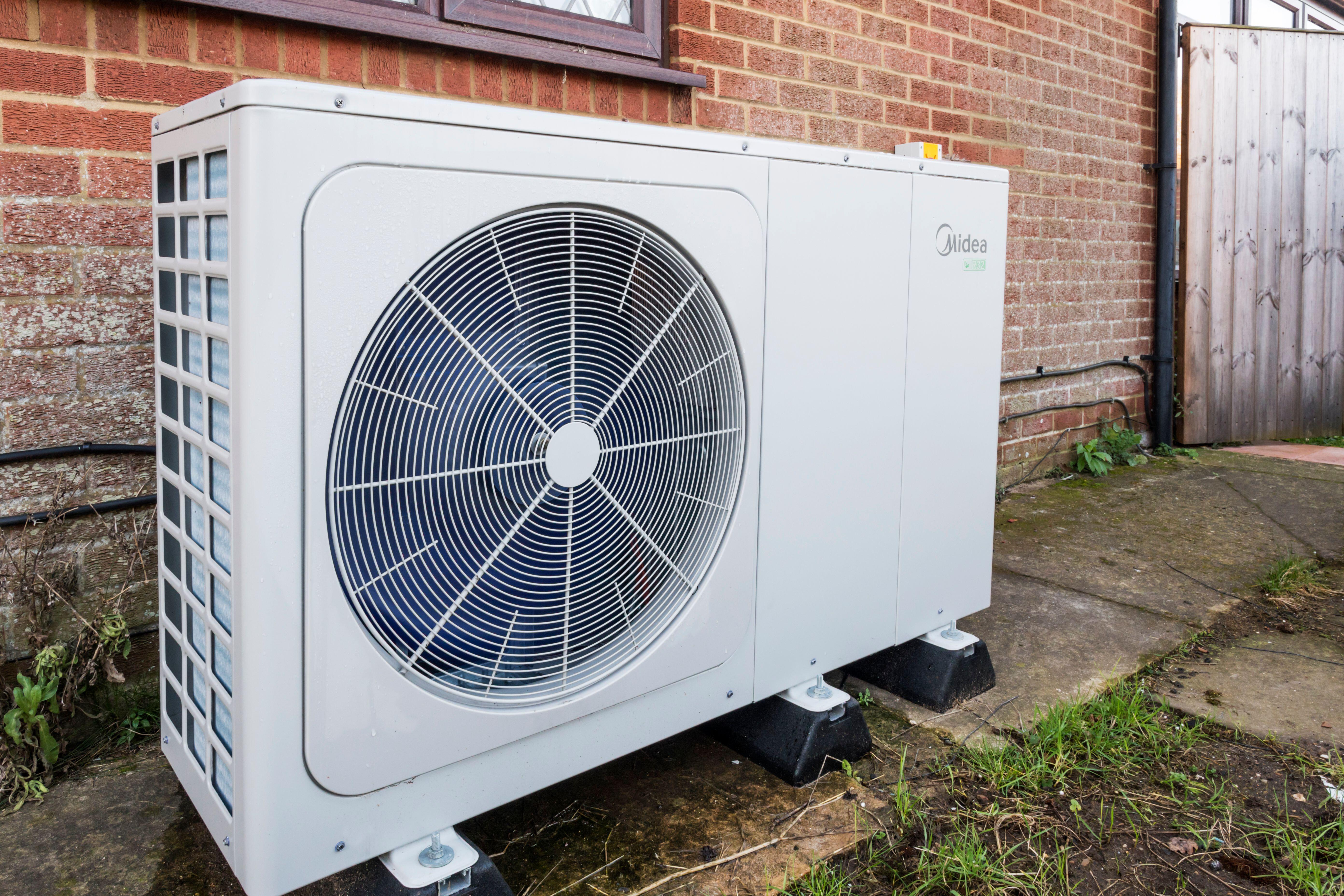 <p>Air source heat pumps use electricity and energy from the air to produce heating and hot water (Alamy/PA)</p>