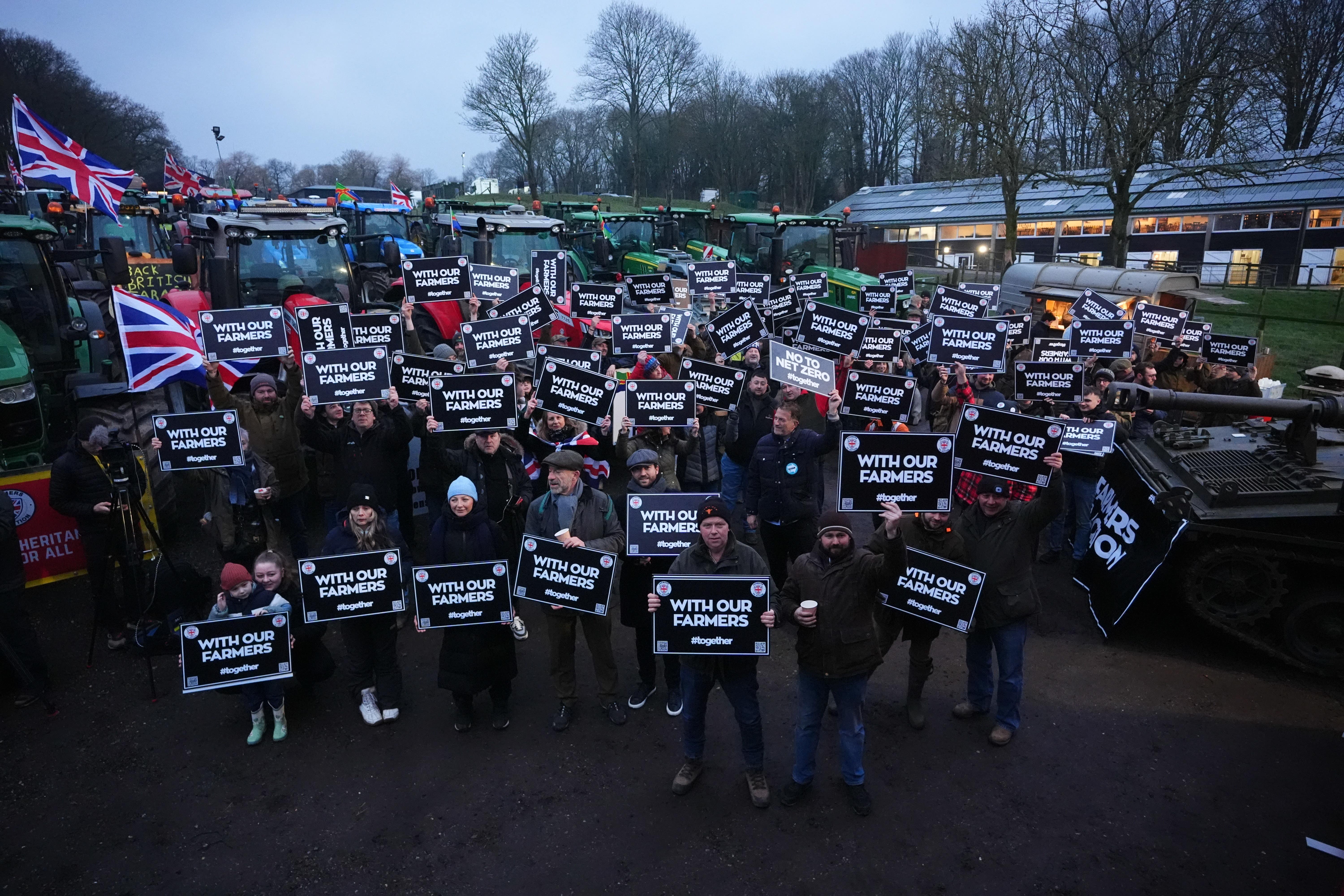 Farmers and their tractors at Belmont Farm in north London (James Manning/PA)