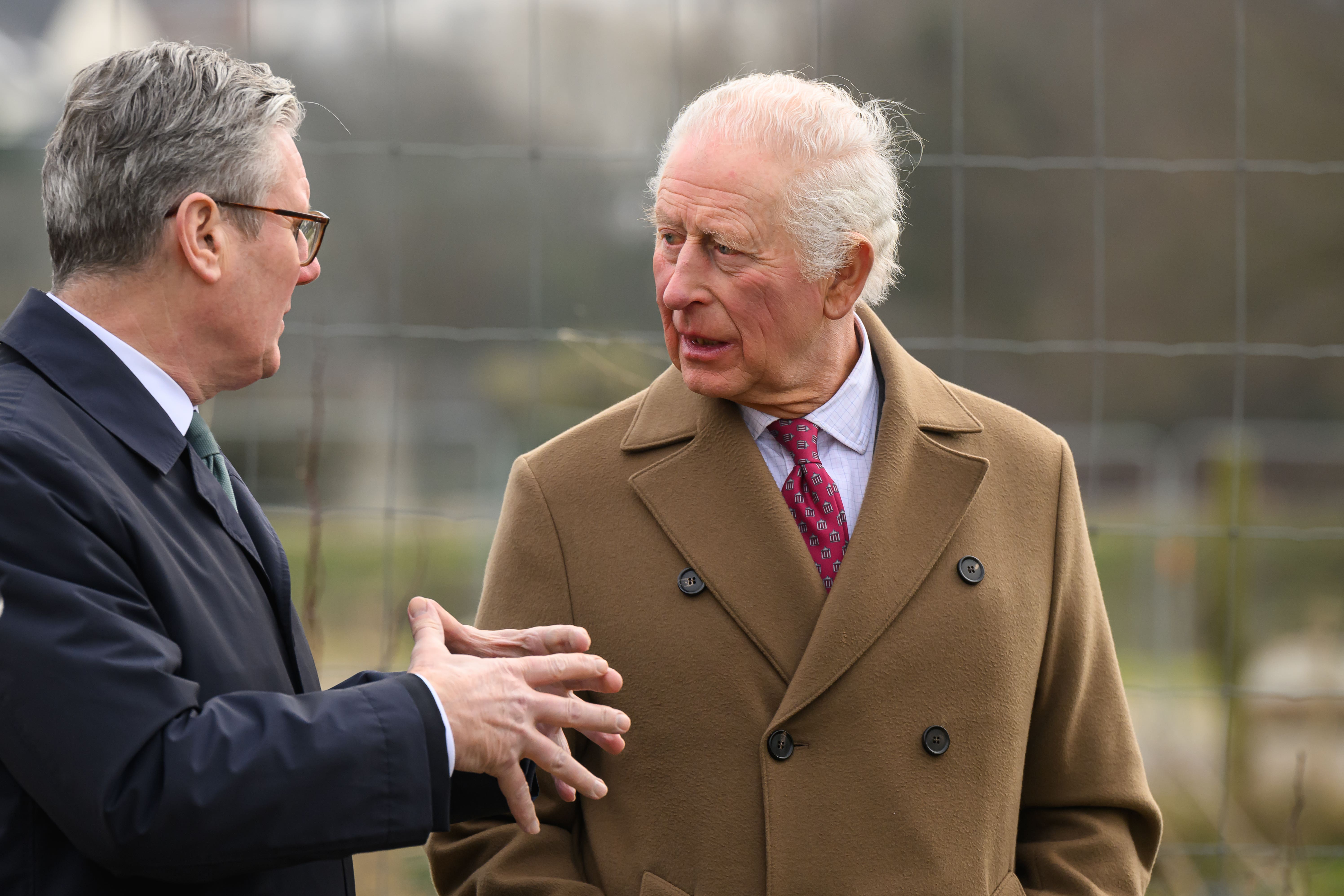 Charles, right, took Sir Keir Starmer and Deputy Prime Minister Angela Rayner on a visit to a Cornish housing development (Leon Neal/PA)