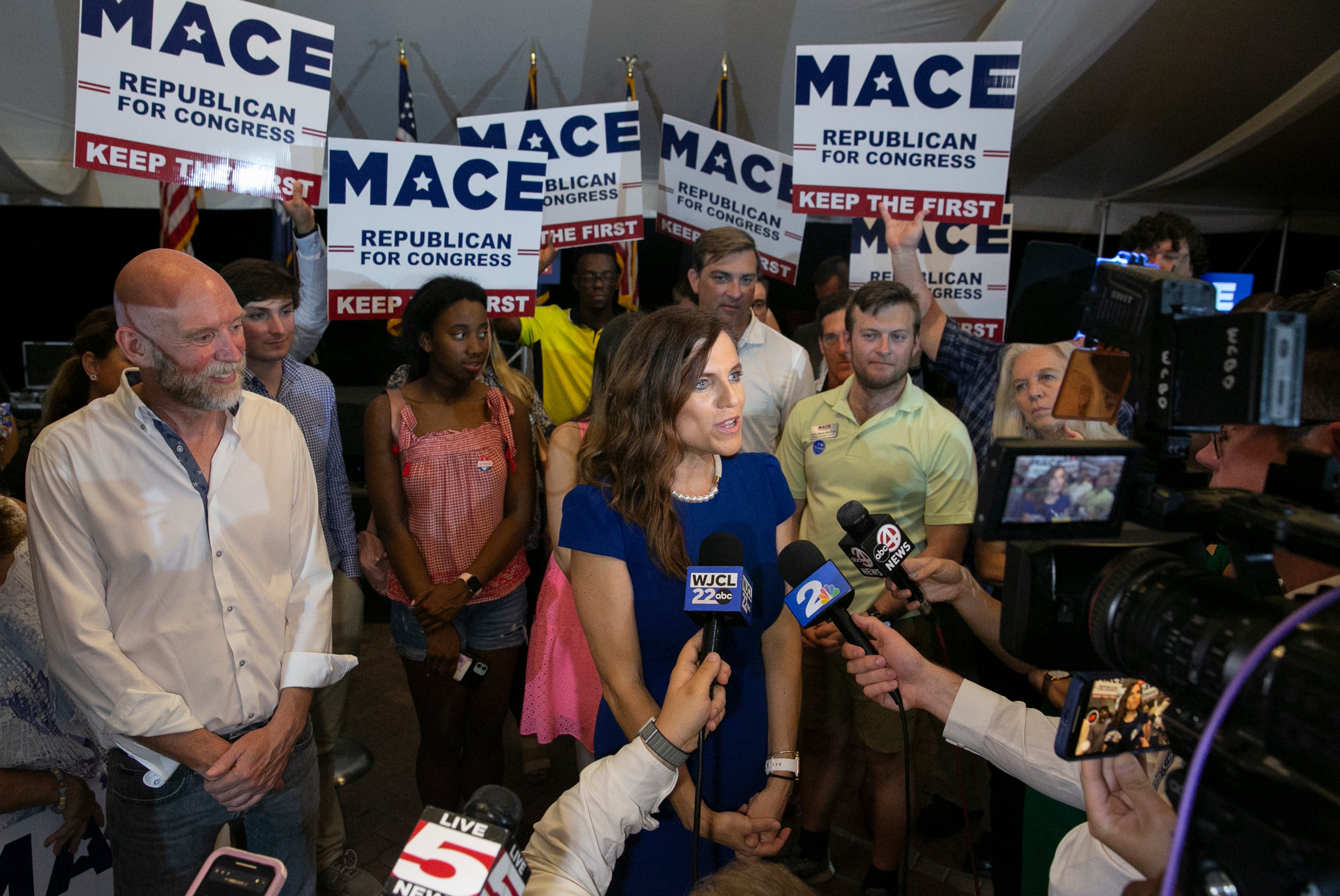 Nancy Mace with Patrick Byrant (far left) at a campaign event in Mount Pleasant, South Carolina, in June 2022