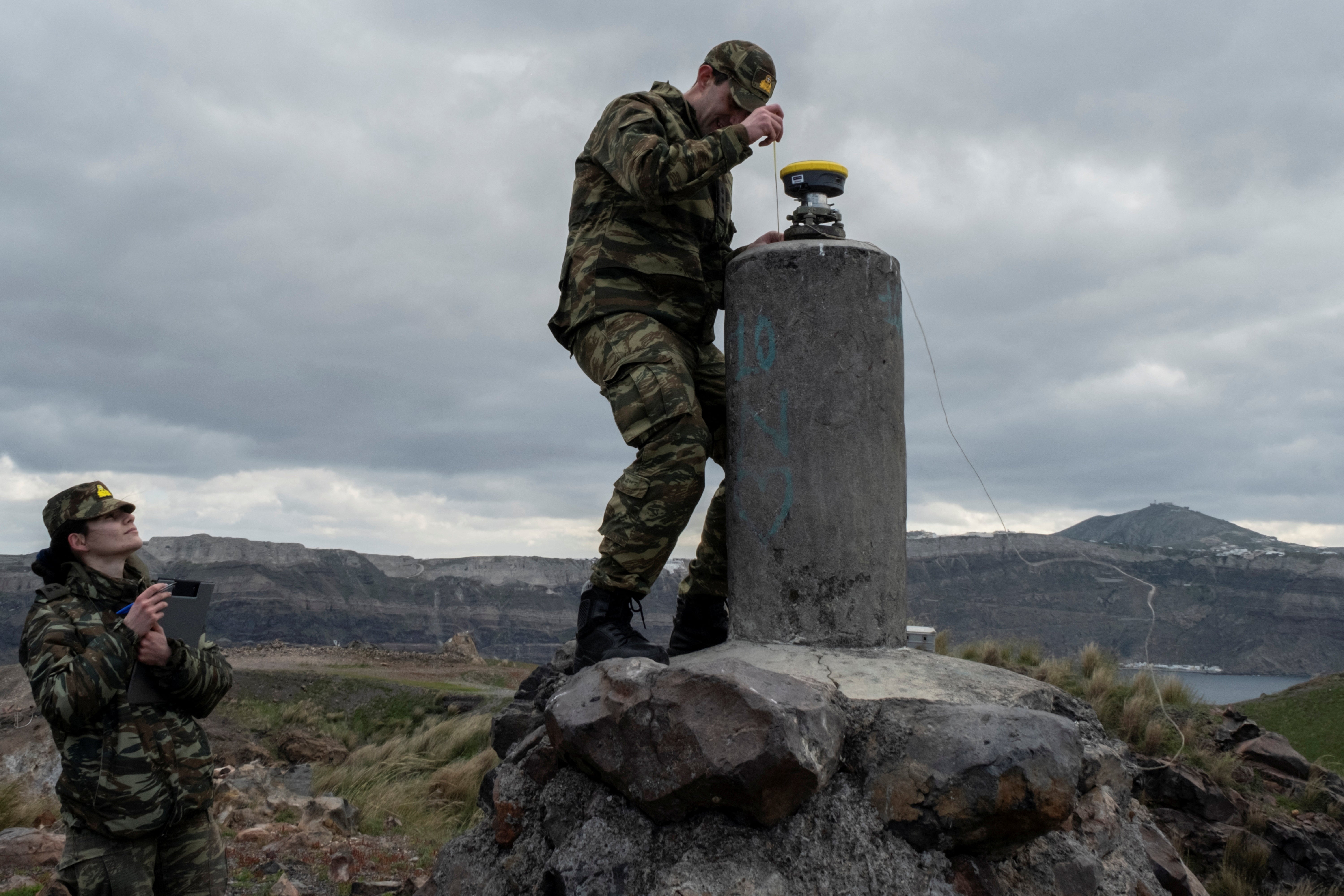 The Greek military take measurements on Santorini's neighbouring volcanic island of Nea Kameni