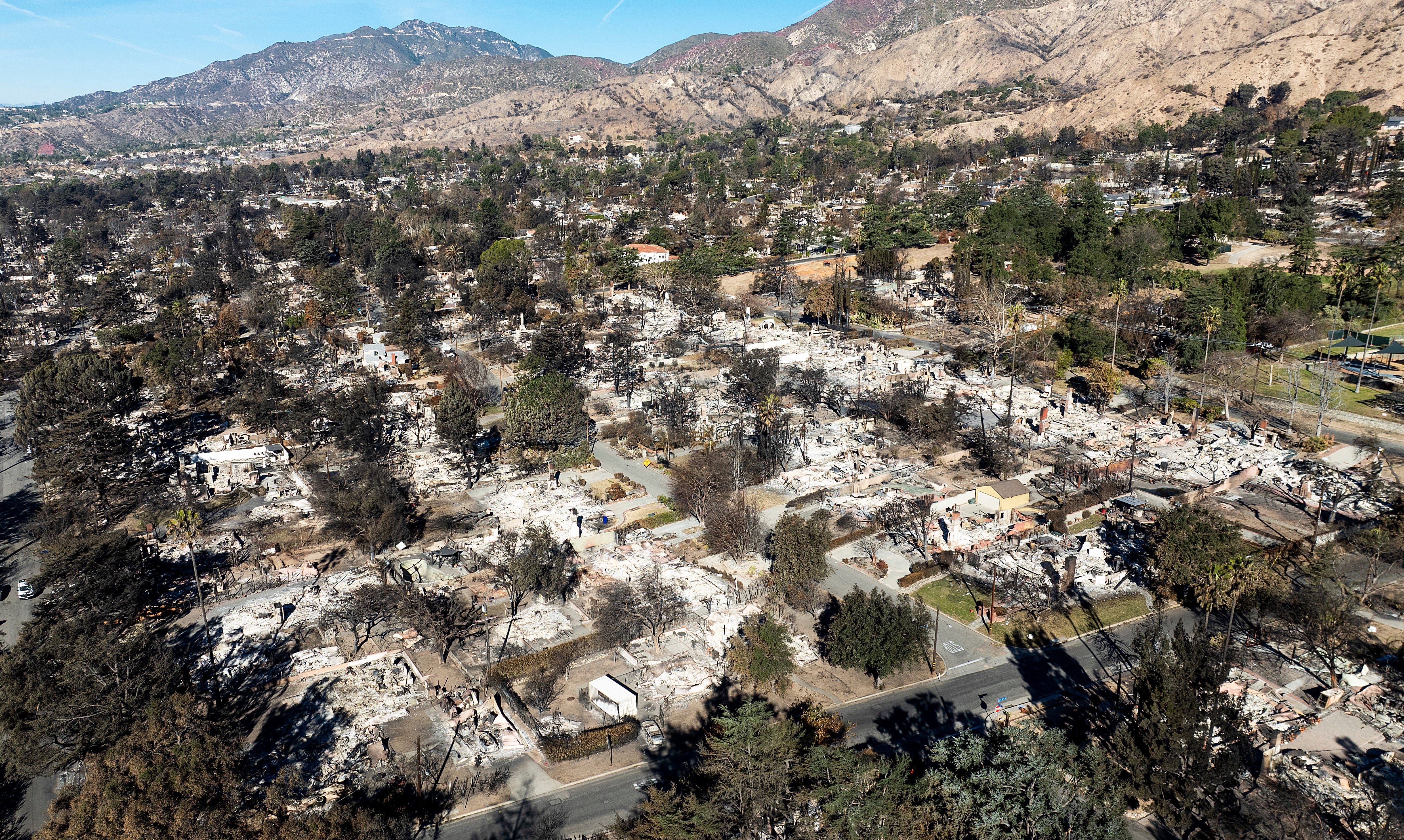 Residences destroyed by the Eaton Fire line a neighborhood in Altadena, Calif., on Tuesday, Jan. 21
